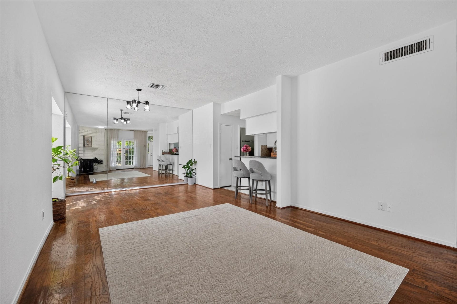 2220 Bering Drive, #12, Houston, TX 77057 Unstaged reverse view of the living room, offering a clear look at the room's layout.