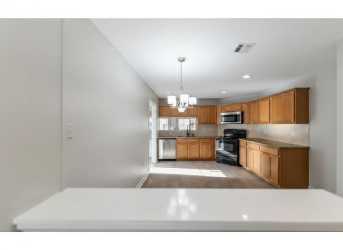 2135 Collingsfield Drive, Sugar Land, TX 77478 Another view of the kitchen.