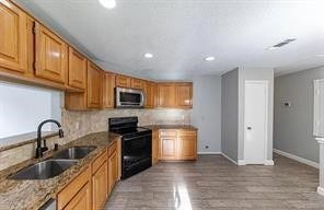 2135 Collingsfield Drive, Sugar Land, TX 77478 Beautiful kitchen with granite countertops.