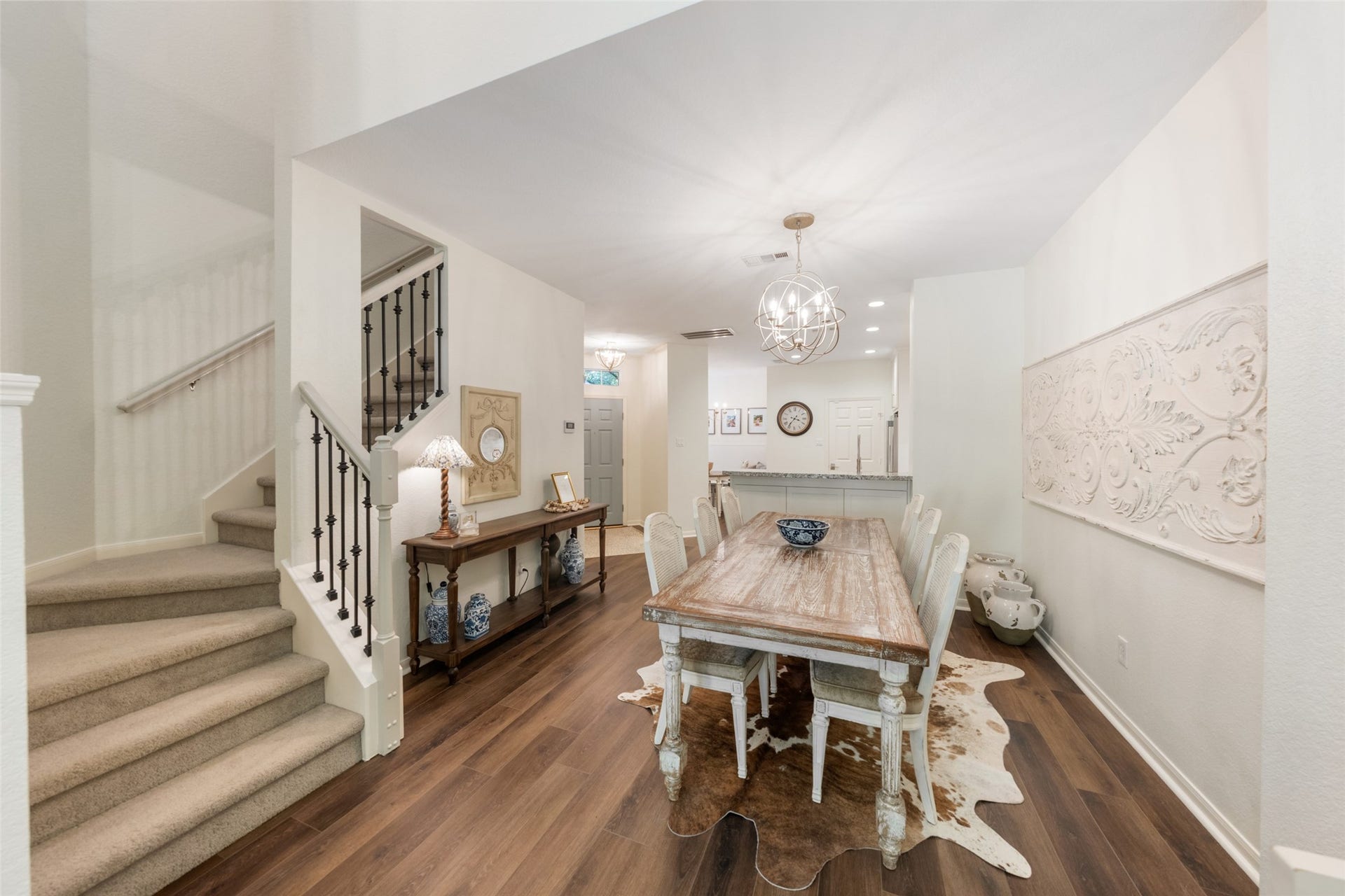 34 Alderon Woods Place, The Woodlands, TX 77382 Charming dining area with staircase leading to the upper level.