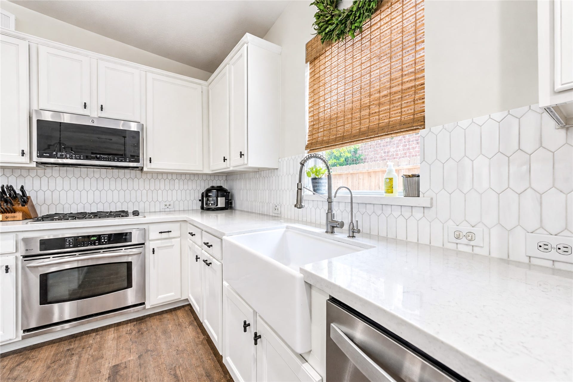 28019 Longspur Drive, Katy, TX 77494 Large sink, and gas stove.