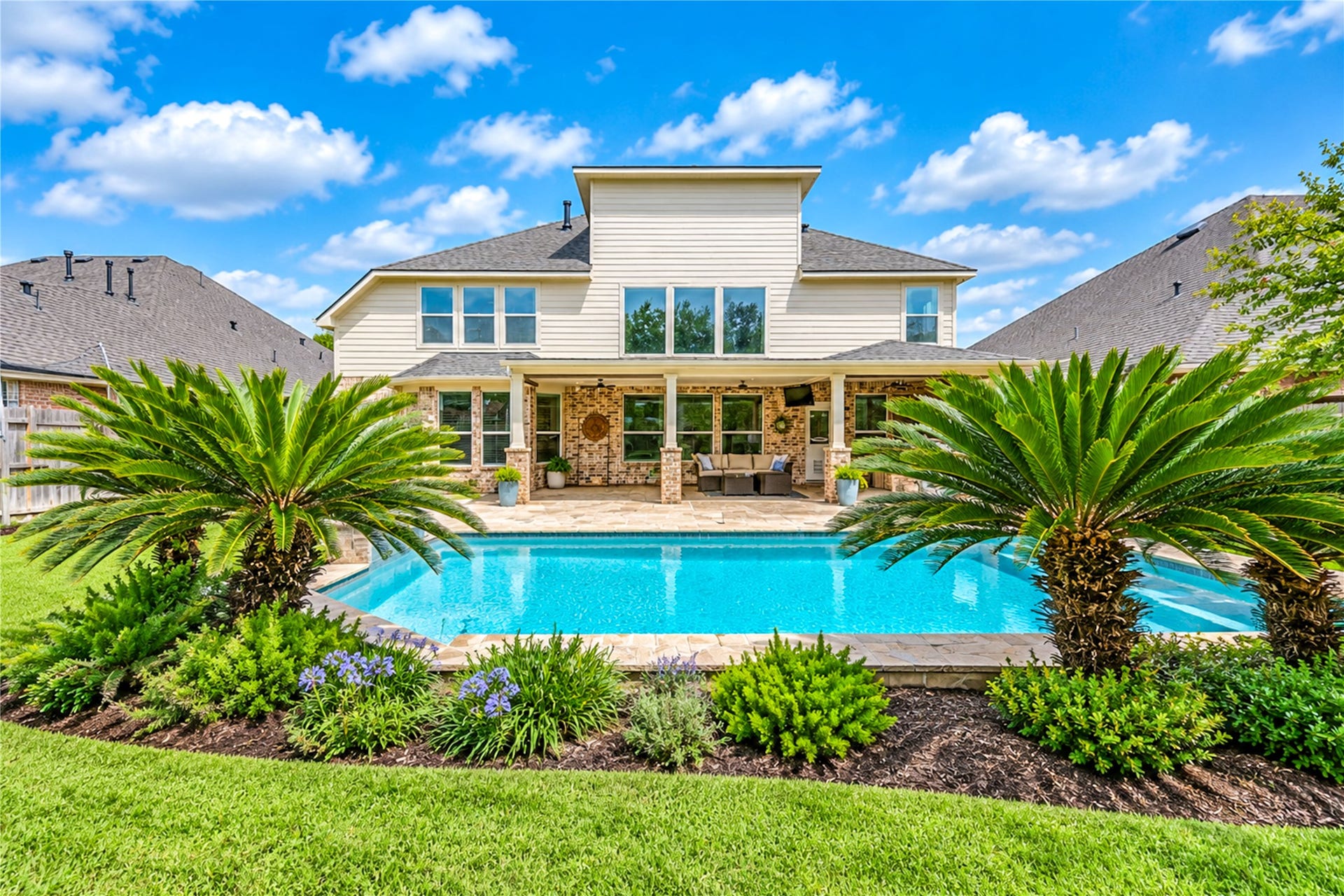 28019 Longspur Drive, Katy, TX 77494 Beautiful backyard with shot of 3 floors - 1st, 2nd and 3rd media room.