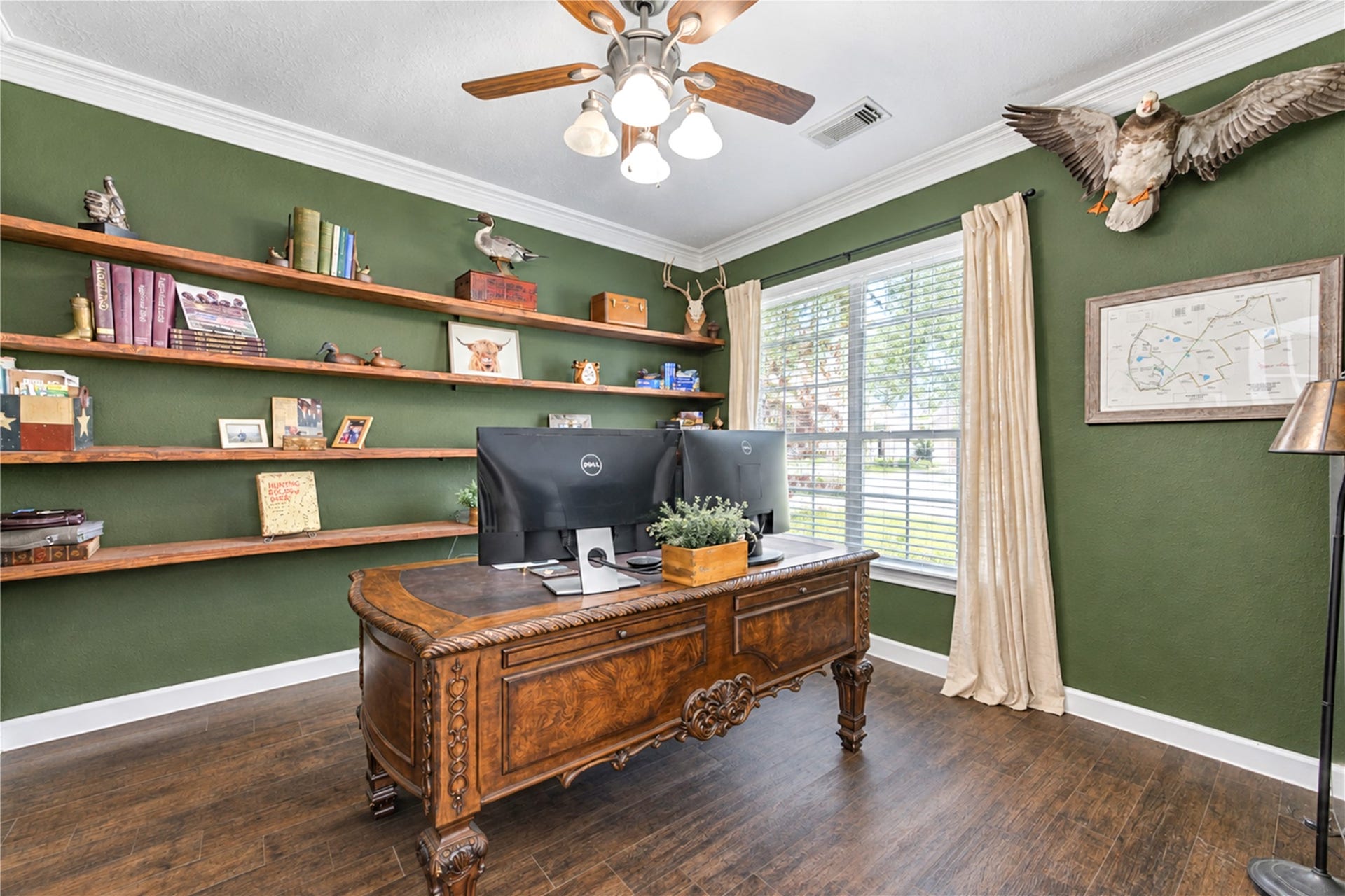 28019 Longspur Drive, Katy, TX 77494 Colorful office with shelves and fan.
