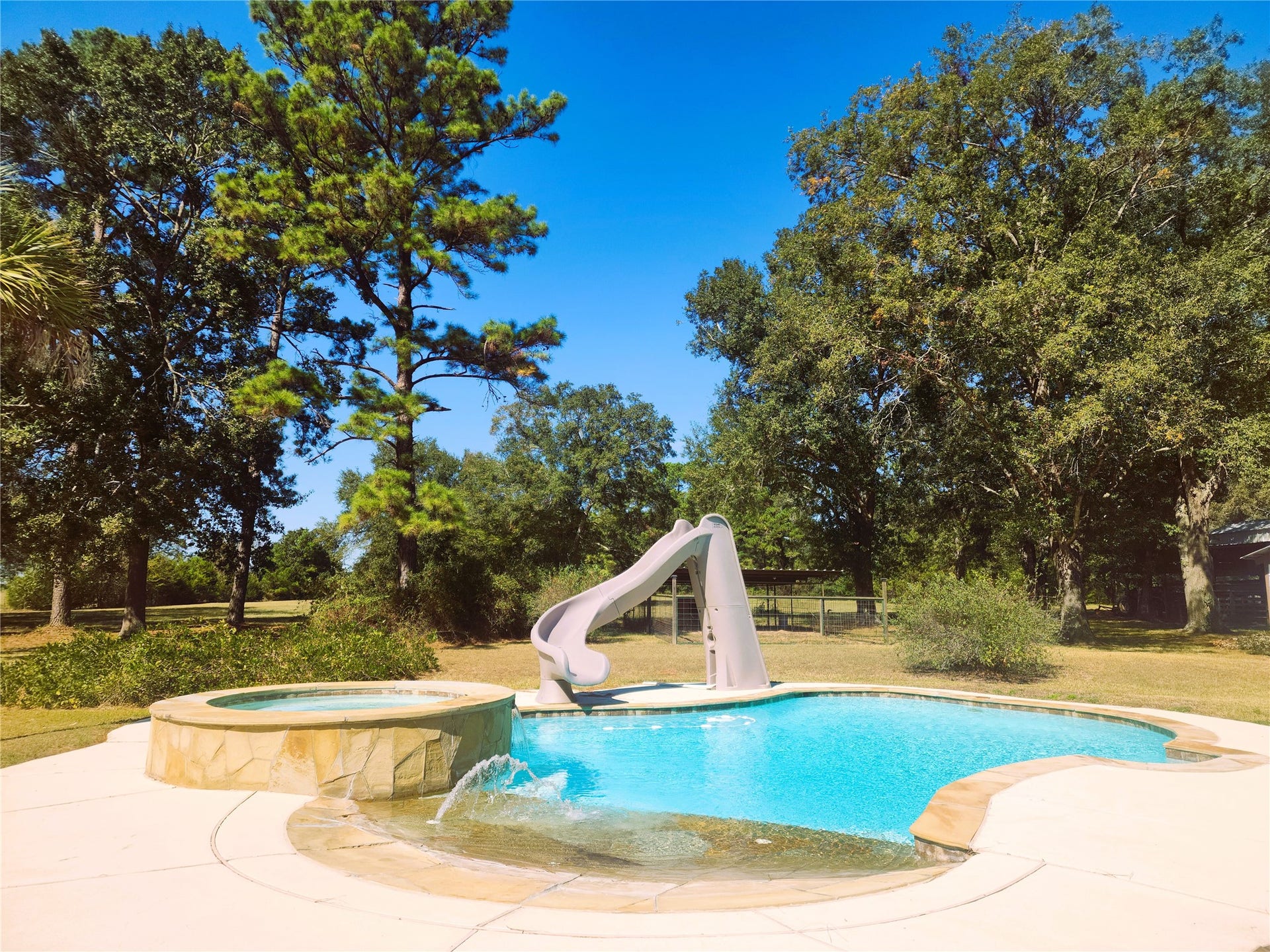 557 Fm 2693 Road E, New Waverly, TX 77358 And don't forget this refreshing saltwater pool!