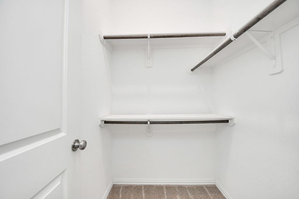 9003 Stanley Oak Drive, Missouri City, TX 77459 Additional storage. Spacious closet.