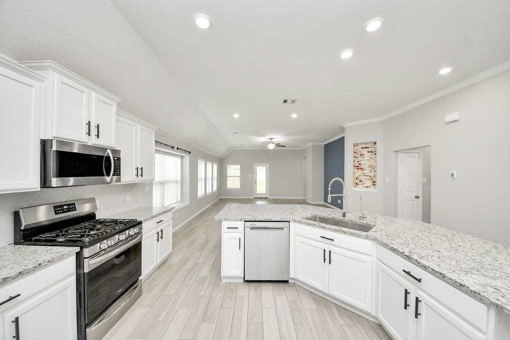 9003 Stanley Oak Drive, Missouri City, TX 77459 Spacious kitchen with lots of storage.