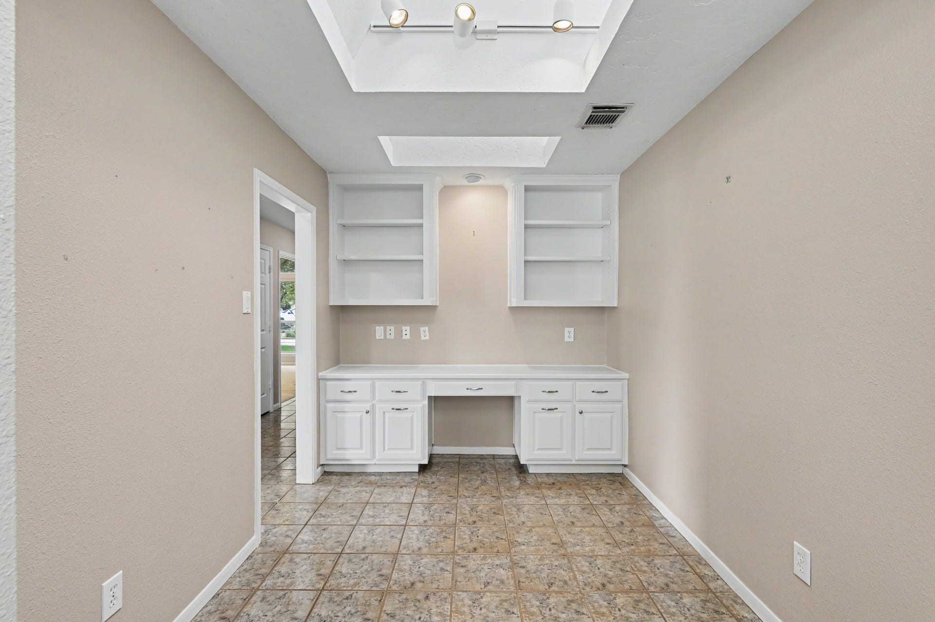 12842 Pelican Island Drive, Willis, TX 77318 Beautiful built-in Home Office with sky lights for natural light.