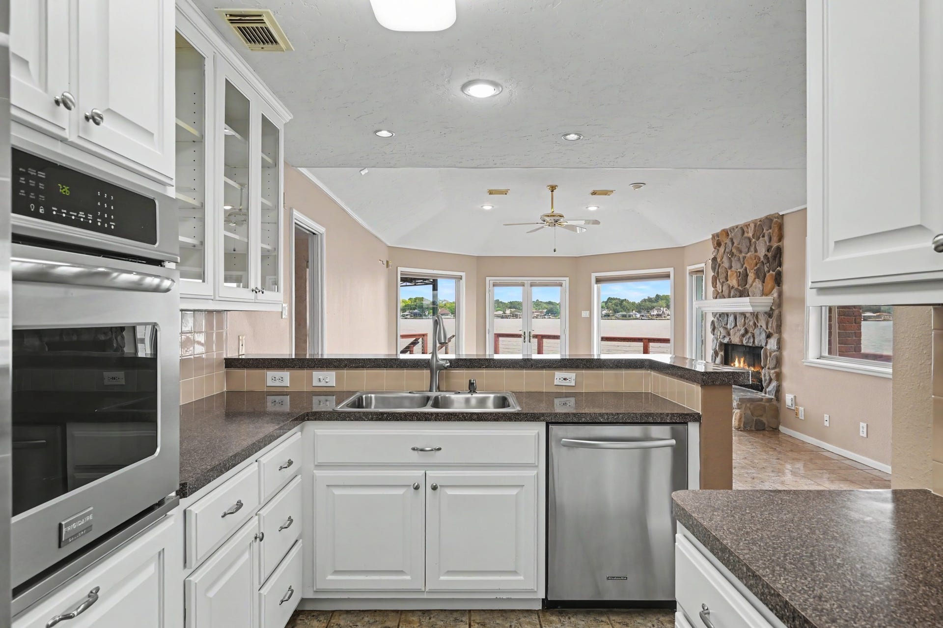 12842 Pelican Island Drive, Willis, TX 77318 Kitchen complete with stainless steel appliances, opens to the Living & Dining Areas,