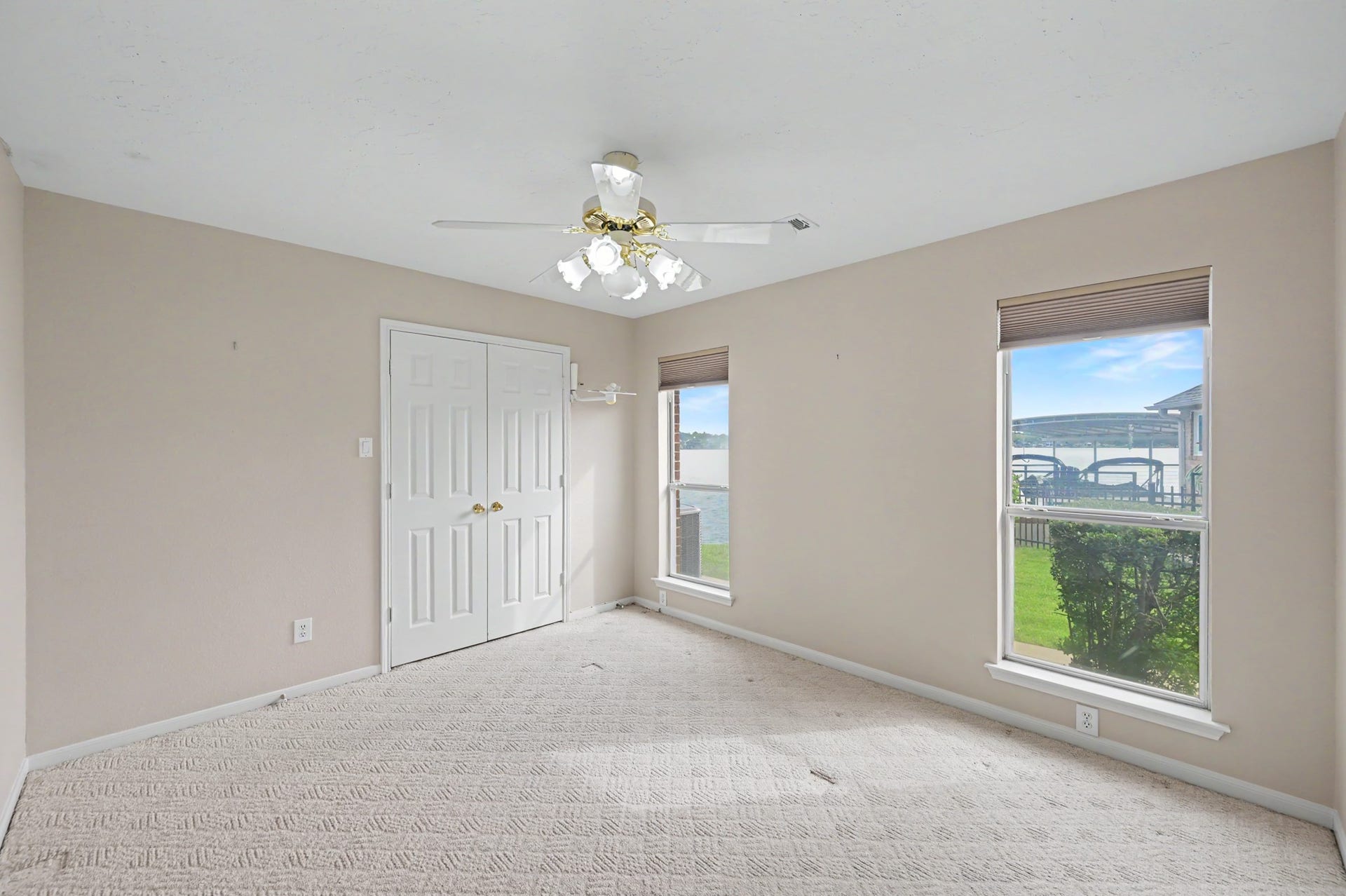 12842 Pelican Island Drive, Willis, TX 77318 Second Guest Bedroom with water views and generous closet.