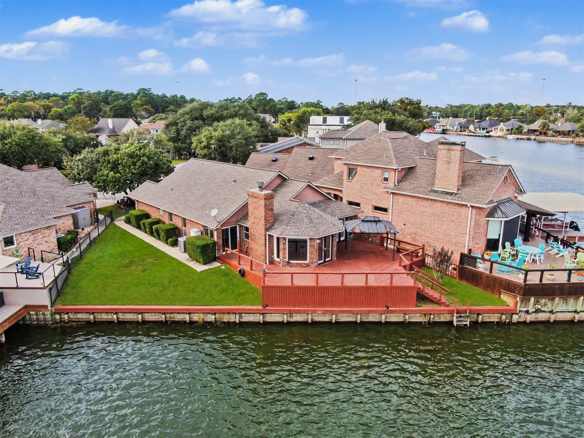12842 Pelican Island Drive, Willis, TX 77318 Aerial view highlighting the lakefront home.