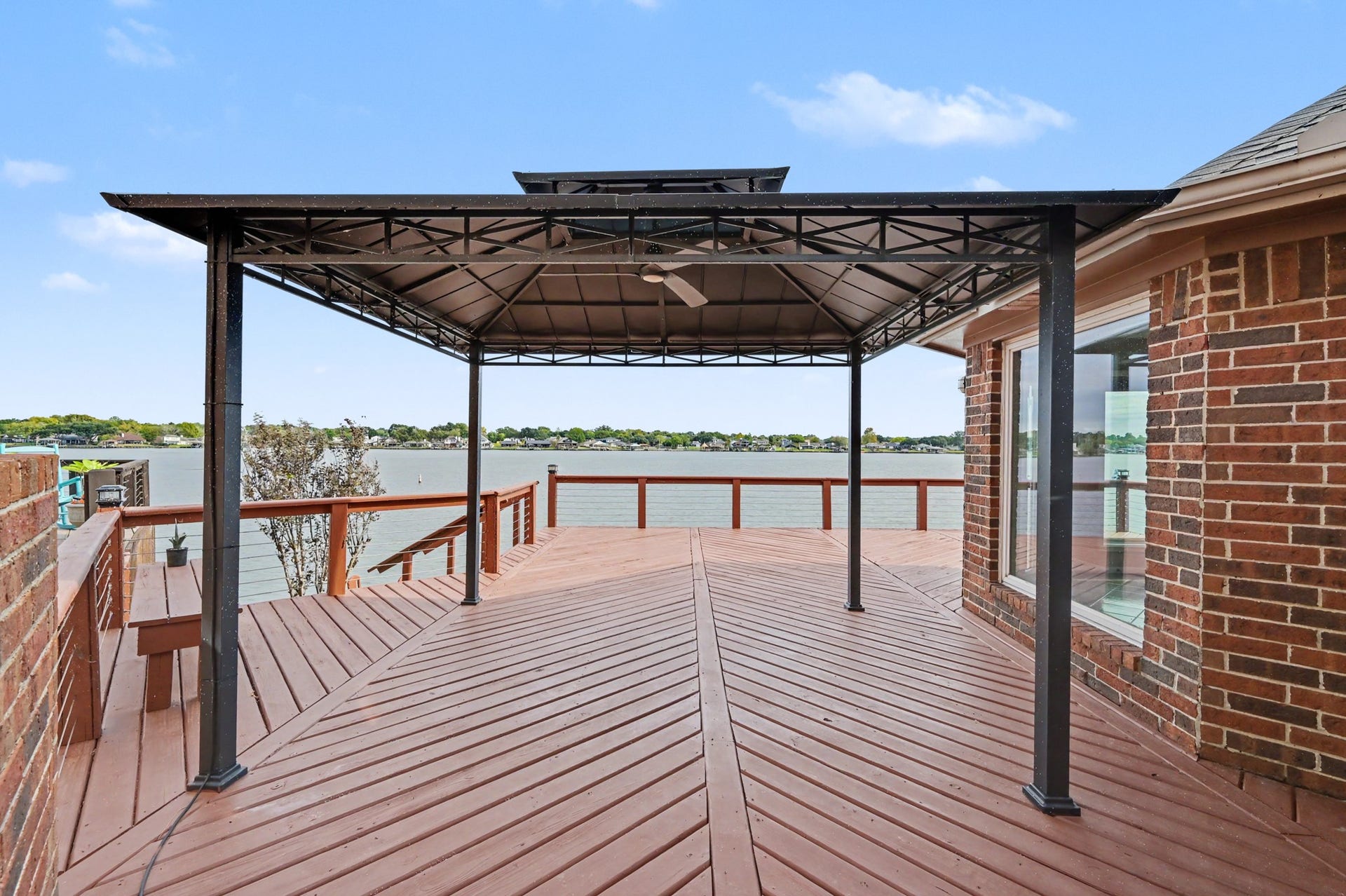12842 Pelican Island Drive, Willis, TX 77318 View of the deck from the Primary Suite French doors.