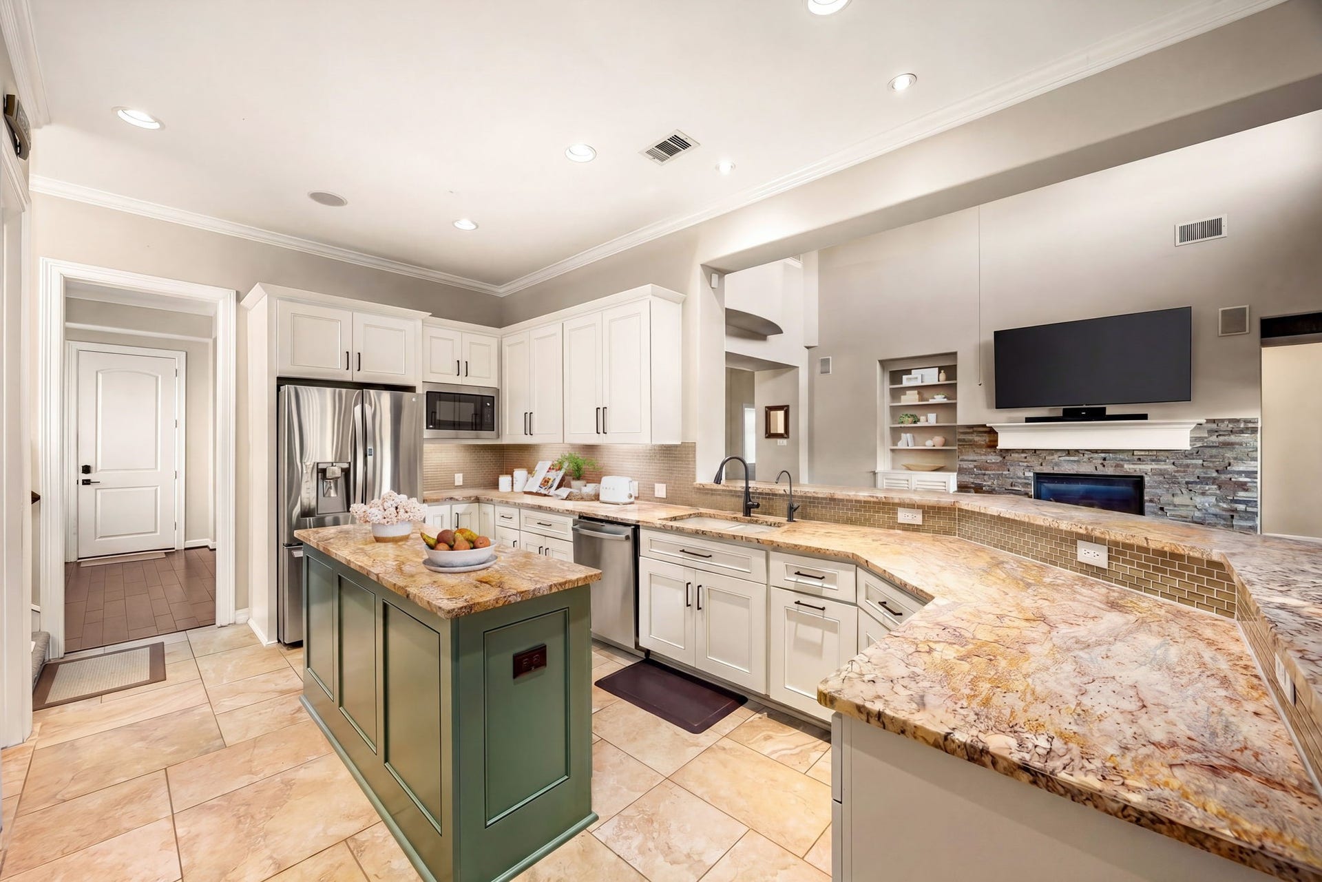 5102 Hawthorne Bend Drive, Katy, TX 77494 Function meets style! Stainless steel appliances, white shaker cabinets, a statement granite island, and a seamless open view into the family room, this kitchen truly is the heart of the home. *Virtually Staged