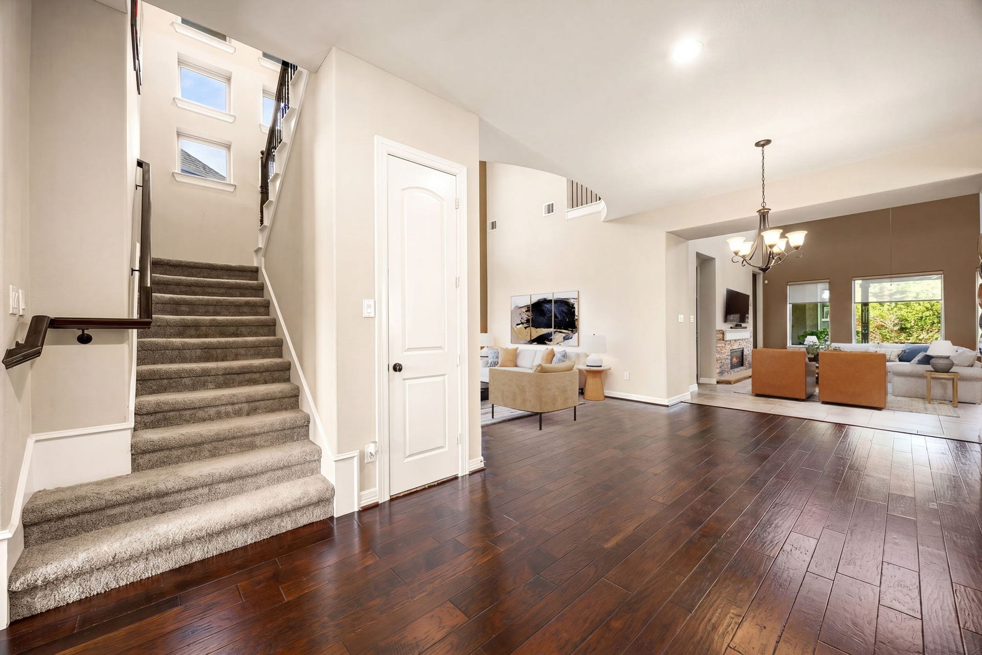 5102 Hawthorne Bend Drive, Katy, TX 77494 Grand entry vibes! Rich hardwood floors, soaring ceilings, and a sweeping staircase welcome you in while opening beautifully into the spacious living area beyond. This home makes a statement from the moment you walk through the door. *Virtually Staged