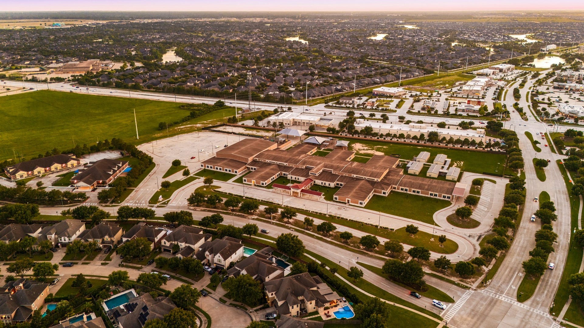 5102 Hawthorne Bend Drive, Katy, TX 77494 This incredible aerial view showcases the proximity to top-rated schools, wide tree-lined streets, and the beautifully established Cinco Ranch Southwest community. Location doesn't get better than this!