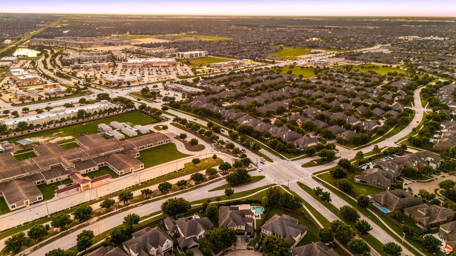 5102 Hawthorne Bend Drive, Katy, TX 77494 Everything you need, right around the corner! This sweeping aerial view highlights the incredible convenience of Cinco Ranch Southwest, top-rated schools, shopping, dining, and major thoroughfares all just minutes away.