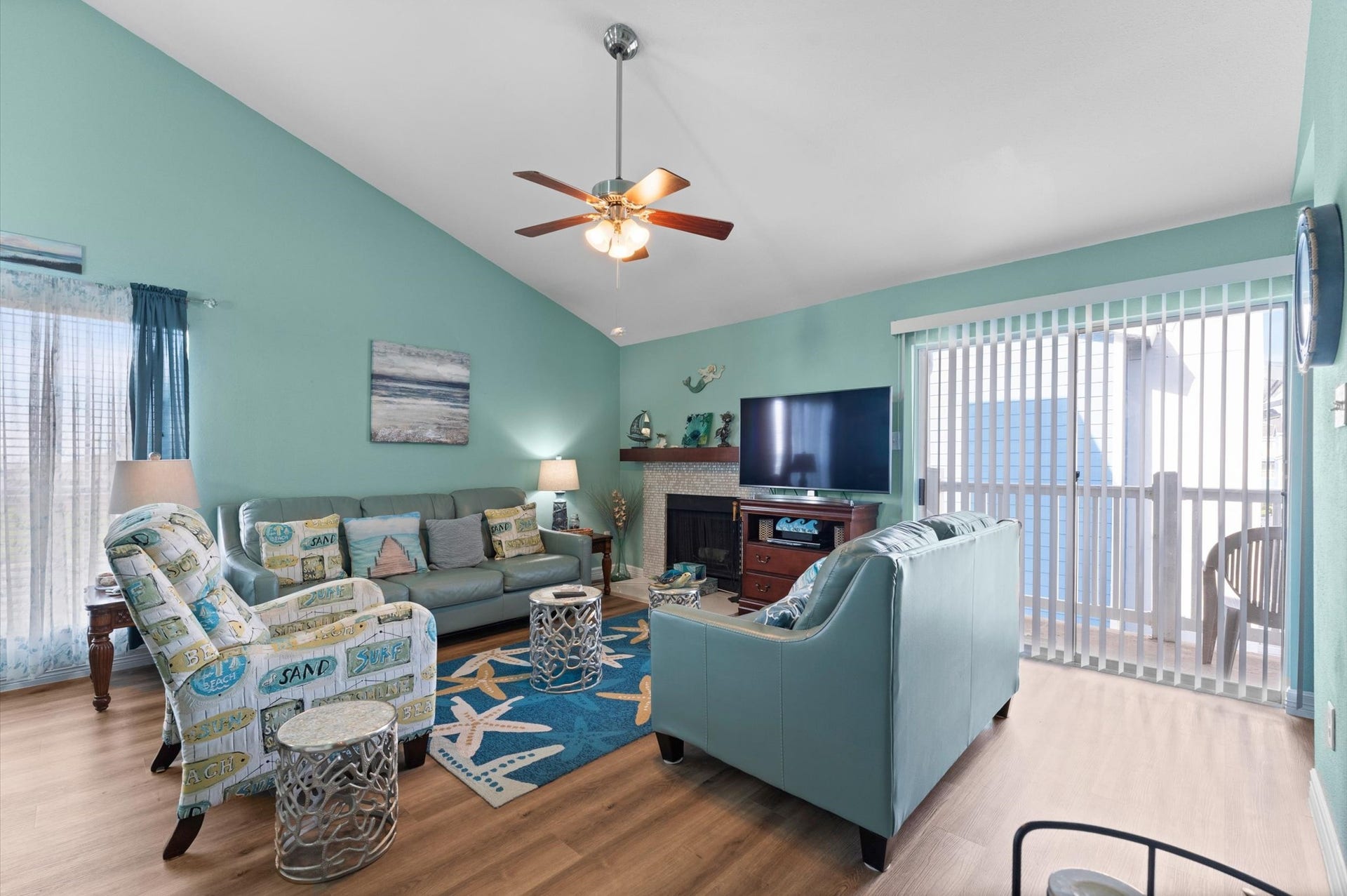 Light abounds in this unit, and the patio doors on both the main floor and primary bedroom upstairs opens up your living space for entertaining and unwinding!