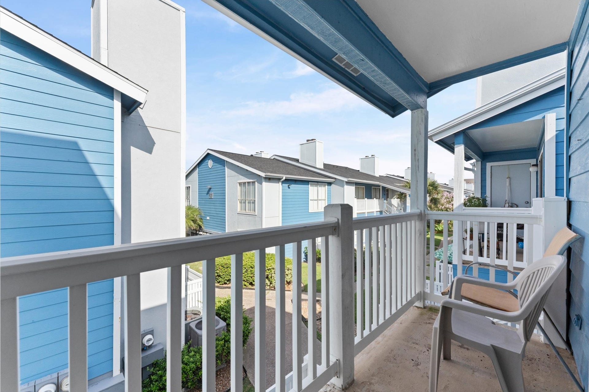 The balcony off of the living room overlooks the courtyard.  Perfect for your morning coffee and nighttime beverage of choice!