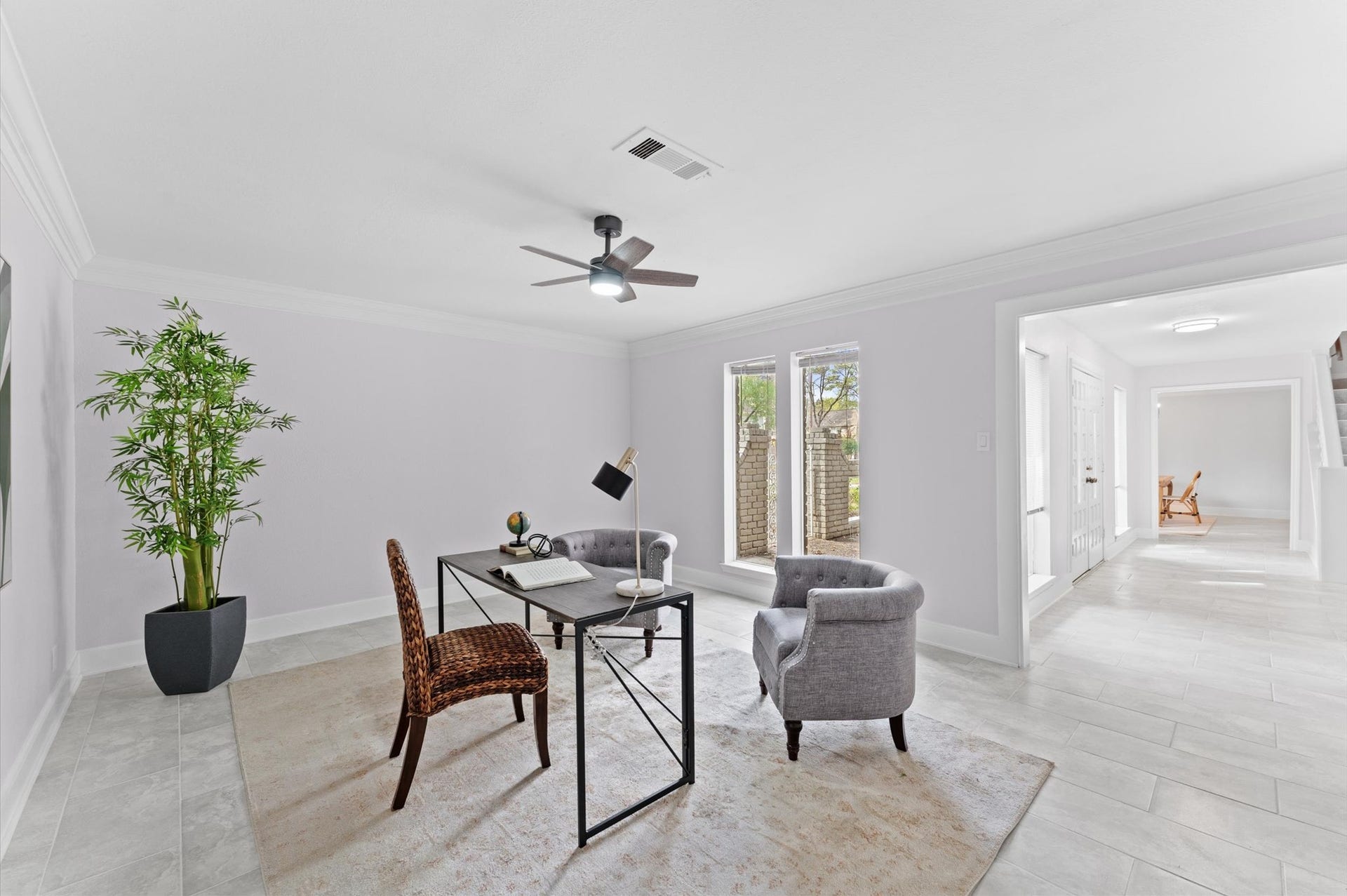 Near the front entry, a formal living space might be utilized as an office space for easy in working from home.