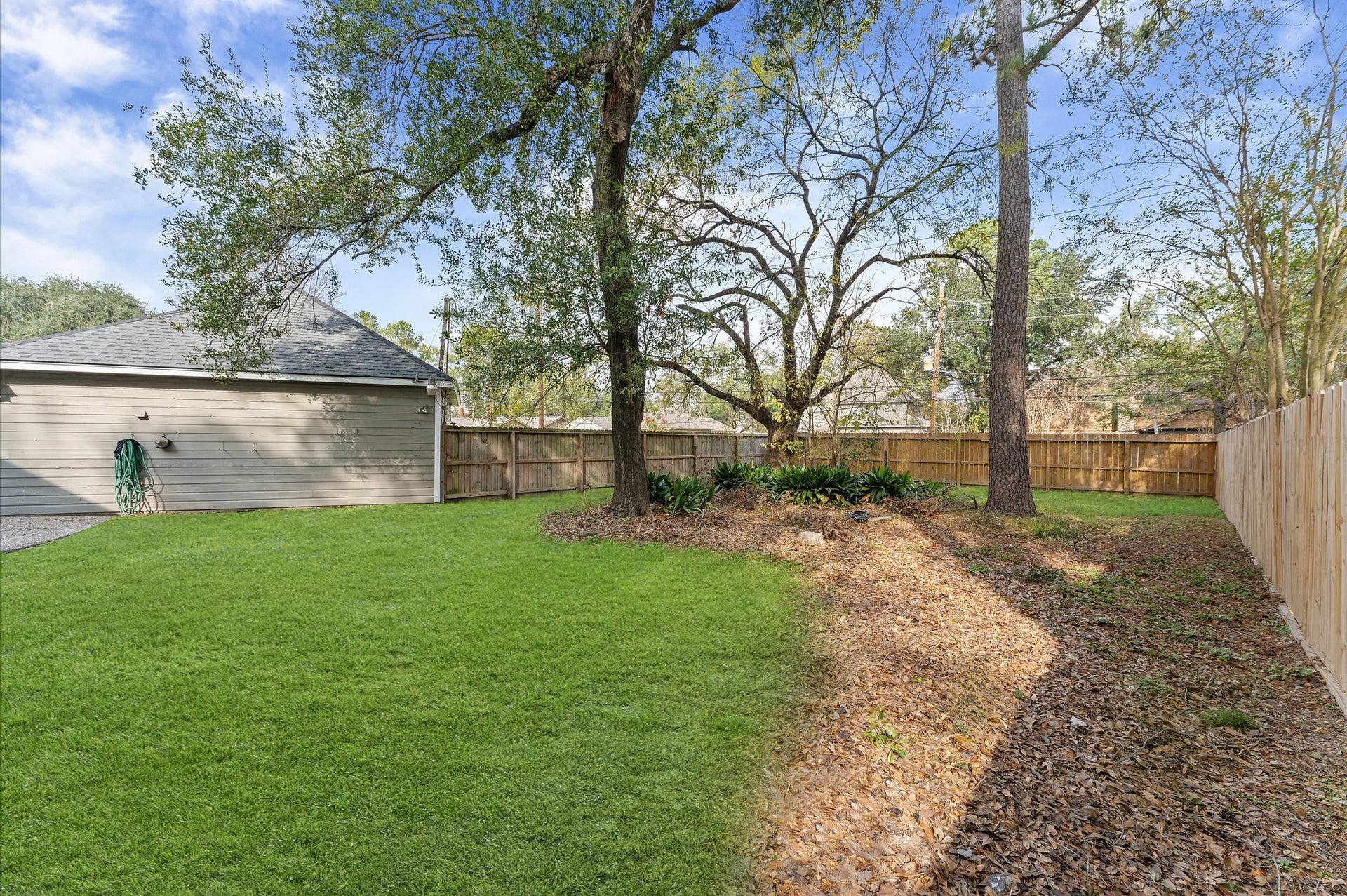 A flower bed is ready for you to add your favorite foliage.