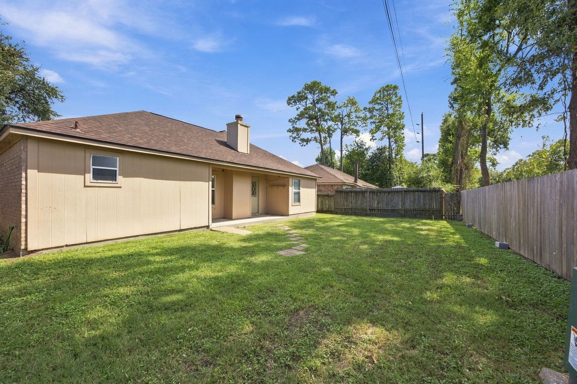 23619 Summer Pine Drive, Spring, TX 77373 Easily entertain your family and friends in the oversized backyard.