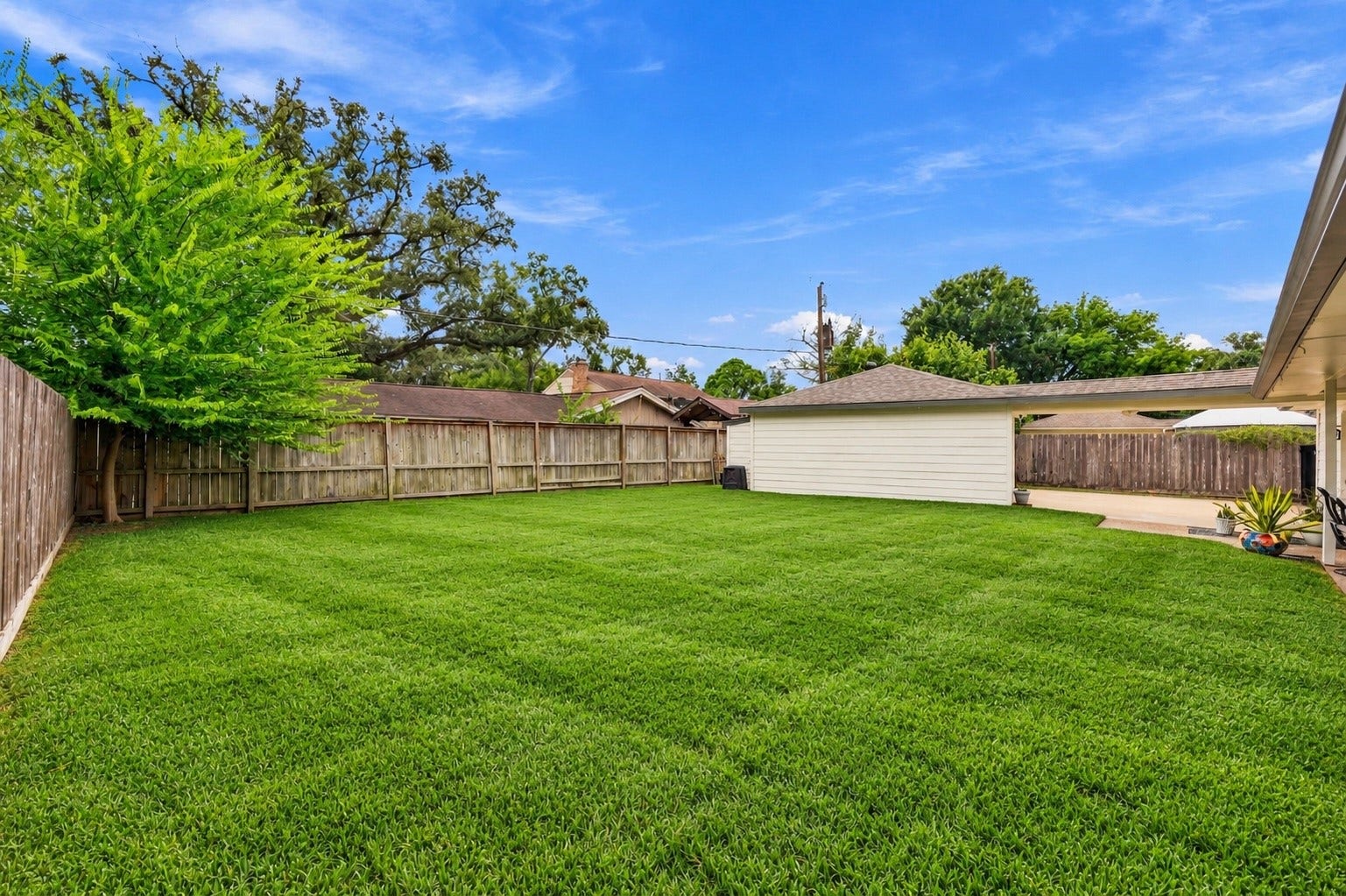 11307 Valley Spring Drive, Houston, TX 77043 Plenty of room for a pool and playset. Grass digitally enhanced.