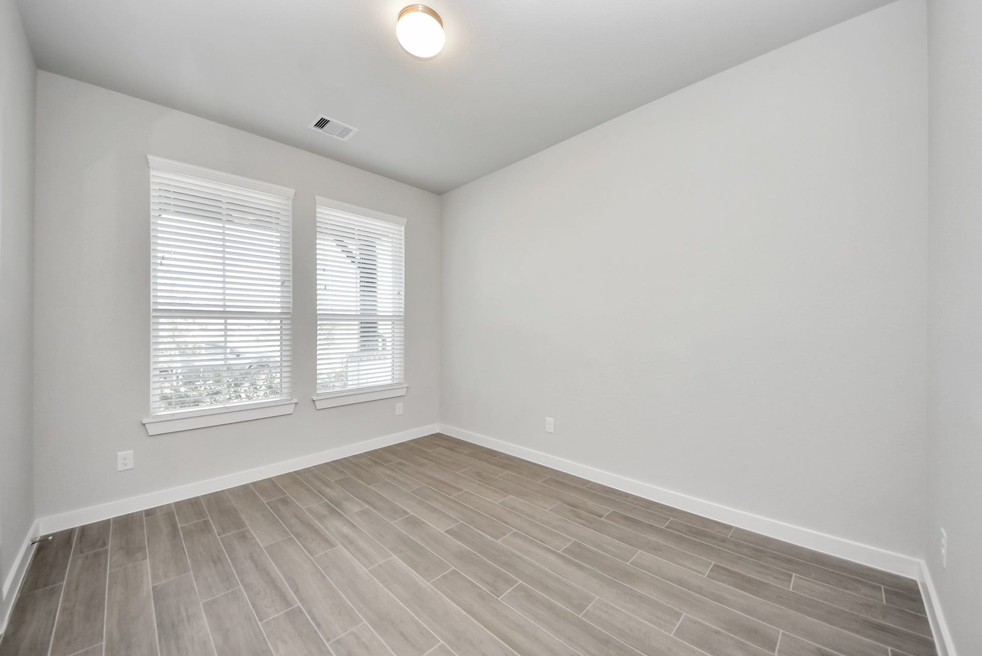 Dedicated first-floor dining space with ample room for a full-size table, perfect for hosting dinners, holidays, and gatherings.