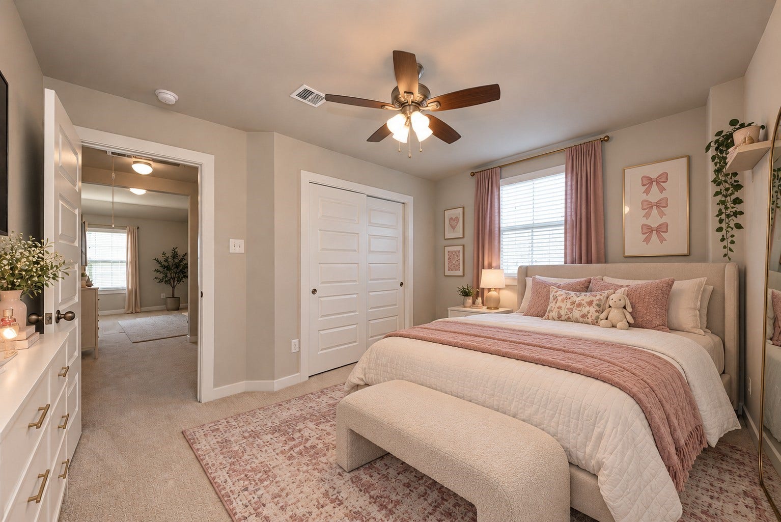 Spacious primary suite comfortably accommodates a king-size bed with room for additional furnishings, while large windows bring in plenty of natural light. *This is virtually staged to illustrate potential layout.