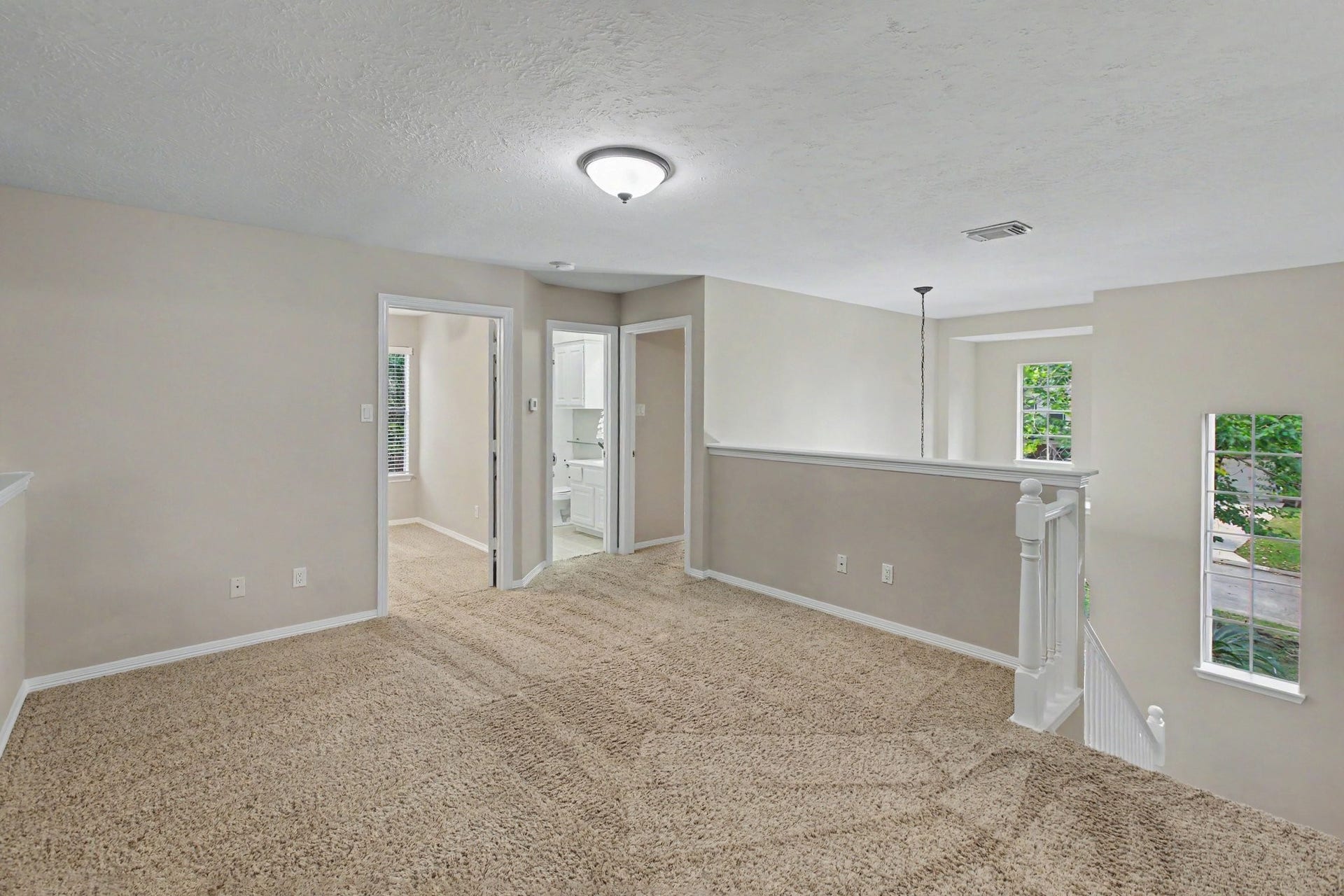 42 S Peaceful Canyon Circle, The Woodlands, TX 77381 When you take a stroll upstairs, you are greeted by the vast game room which branches off to three bedrooms, a full bathroom, and a media room.