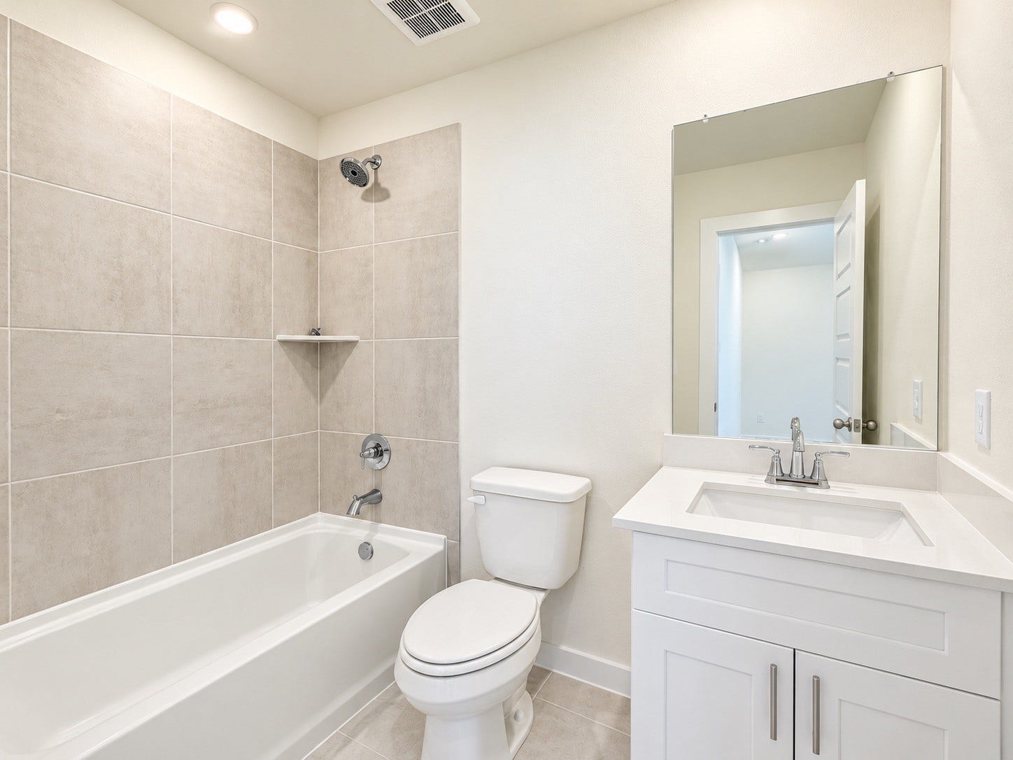 419 Pirate Falls Lane, Crosby, TX 77532 Modern bathroom featuring a vanity and spacious shower/bathtub combo