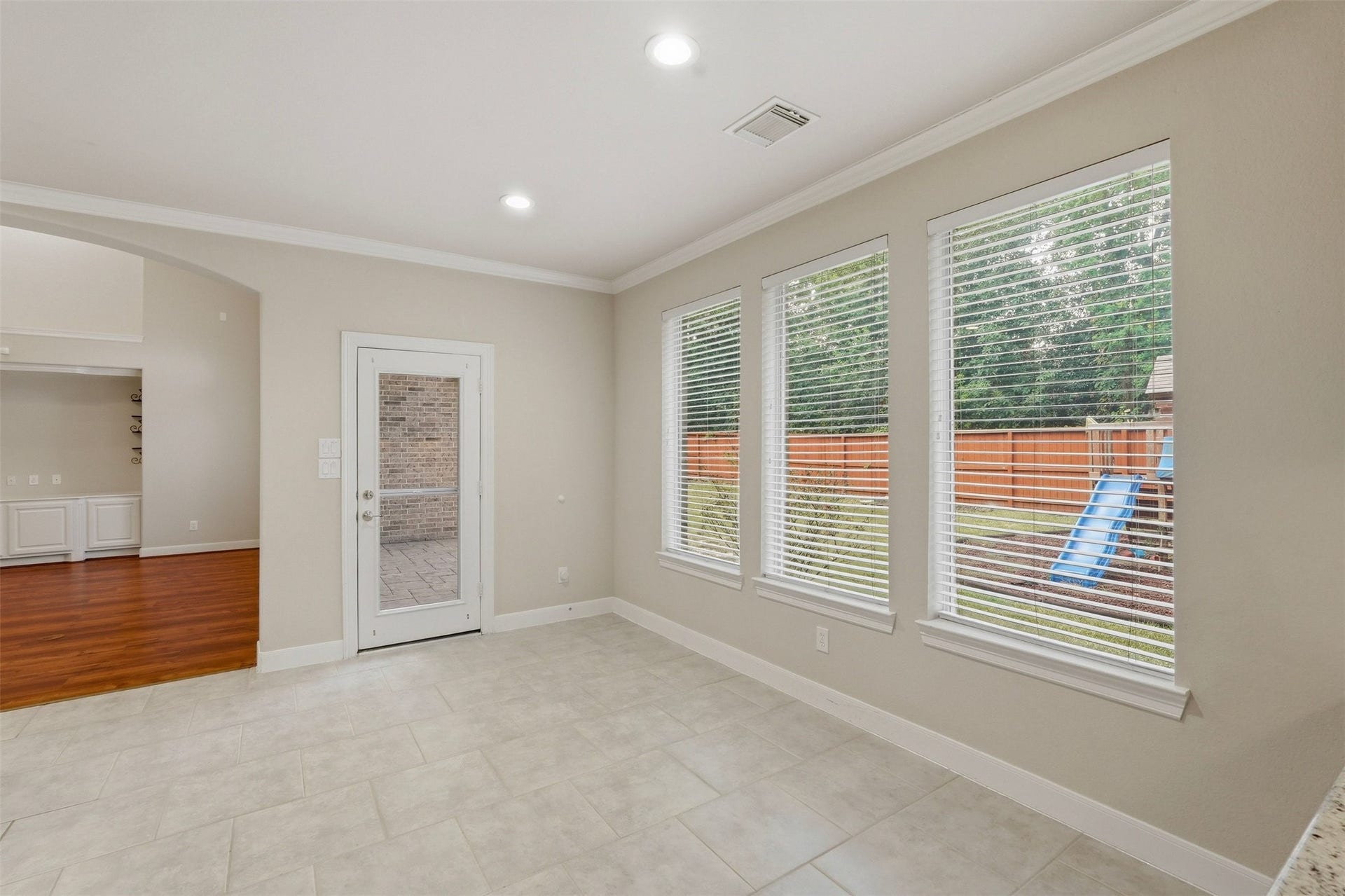 18034 Crescent Royale Way, Humble, TX 77346 Breakfast nook leading to covered back porch