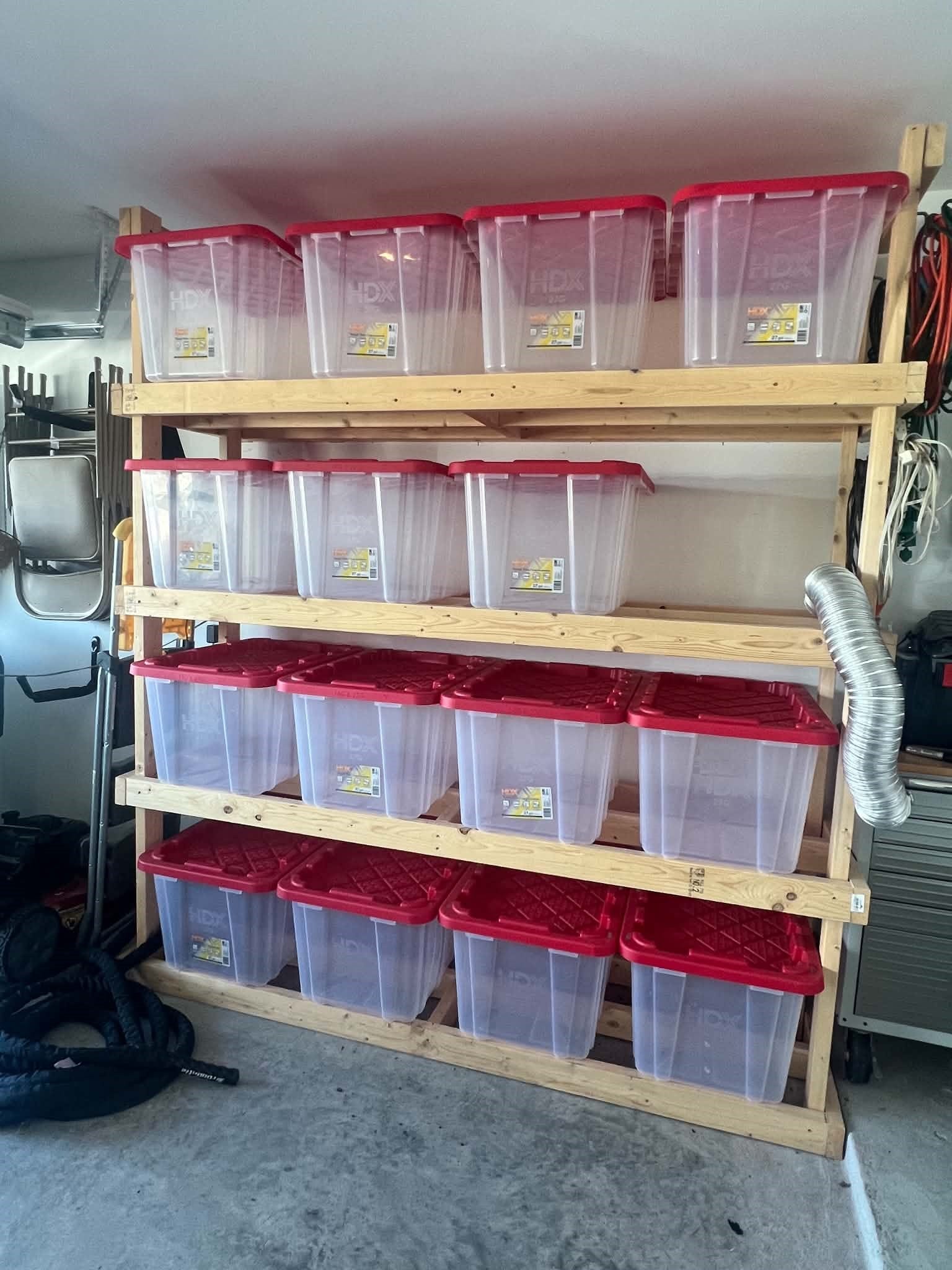 9525 Chelsea Street, Texas City, TX 77591 Secured shelving in garage. Storage bins not included
