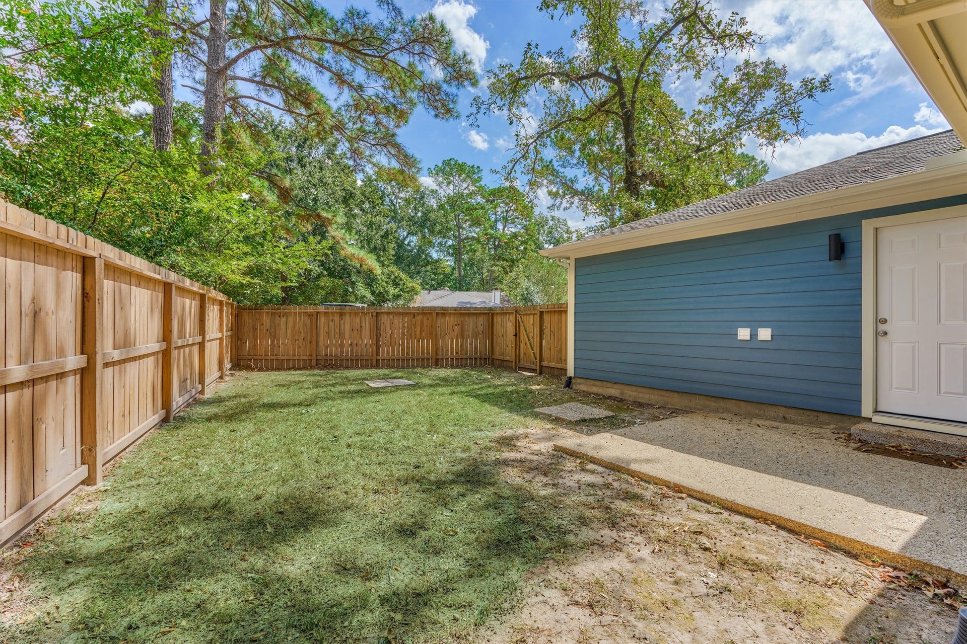 88 W White Willow Circle, The Woodlands, TX 77381 Backyard offers nice privacy with nearby trees adding shade and you do not have homes looking into the backyard.