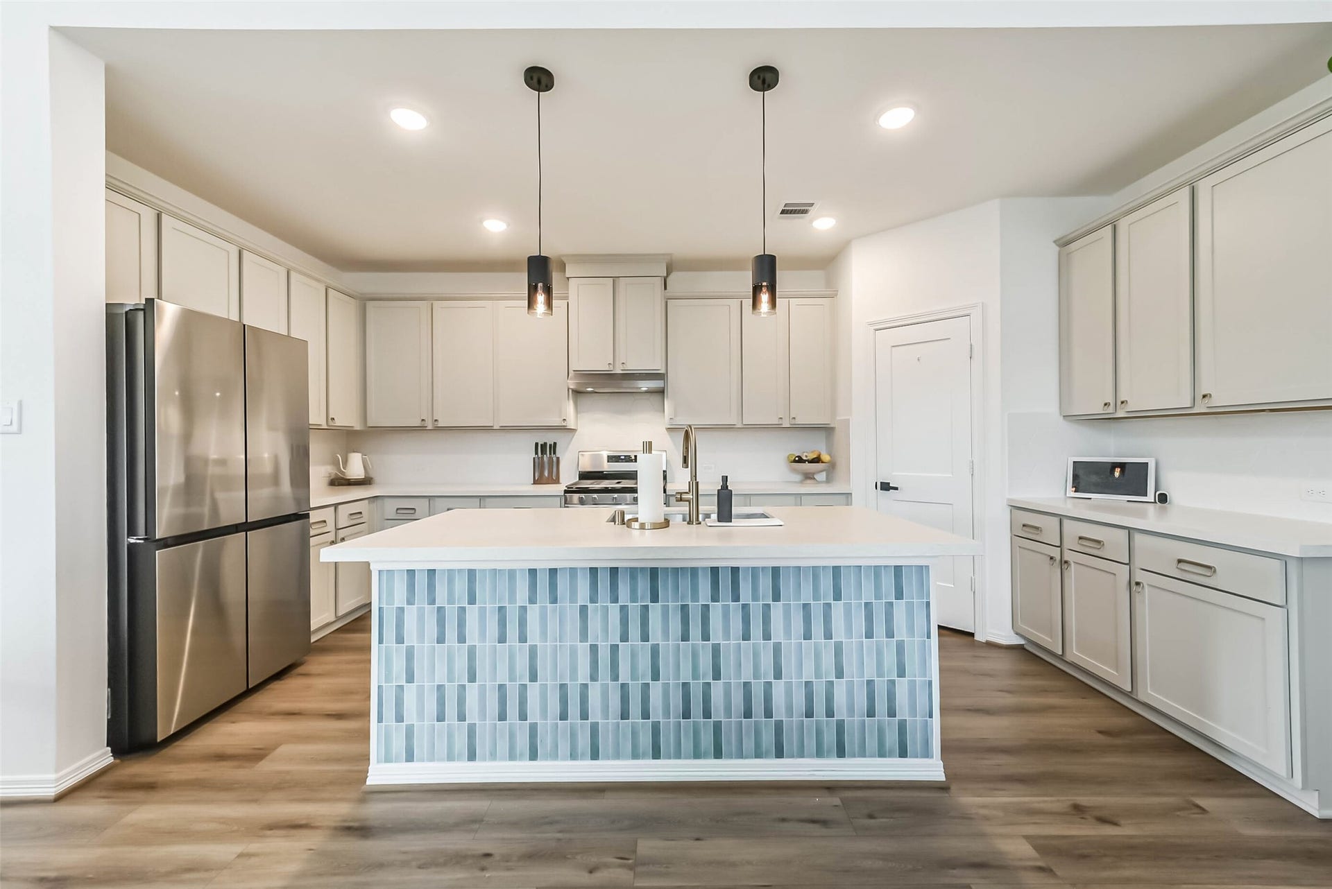 32403 Clouser Crawdad Court, Fulshear, TX 77441 The pantry is very spacious, another builder upgrade to extend further back.