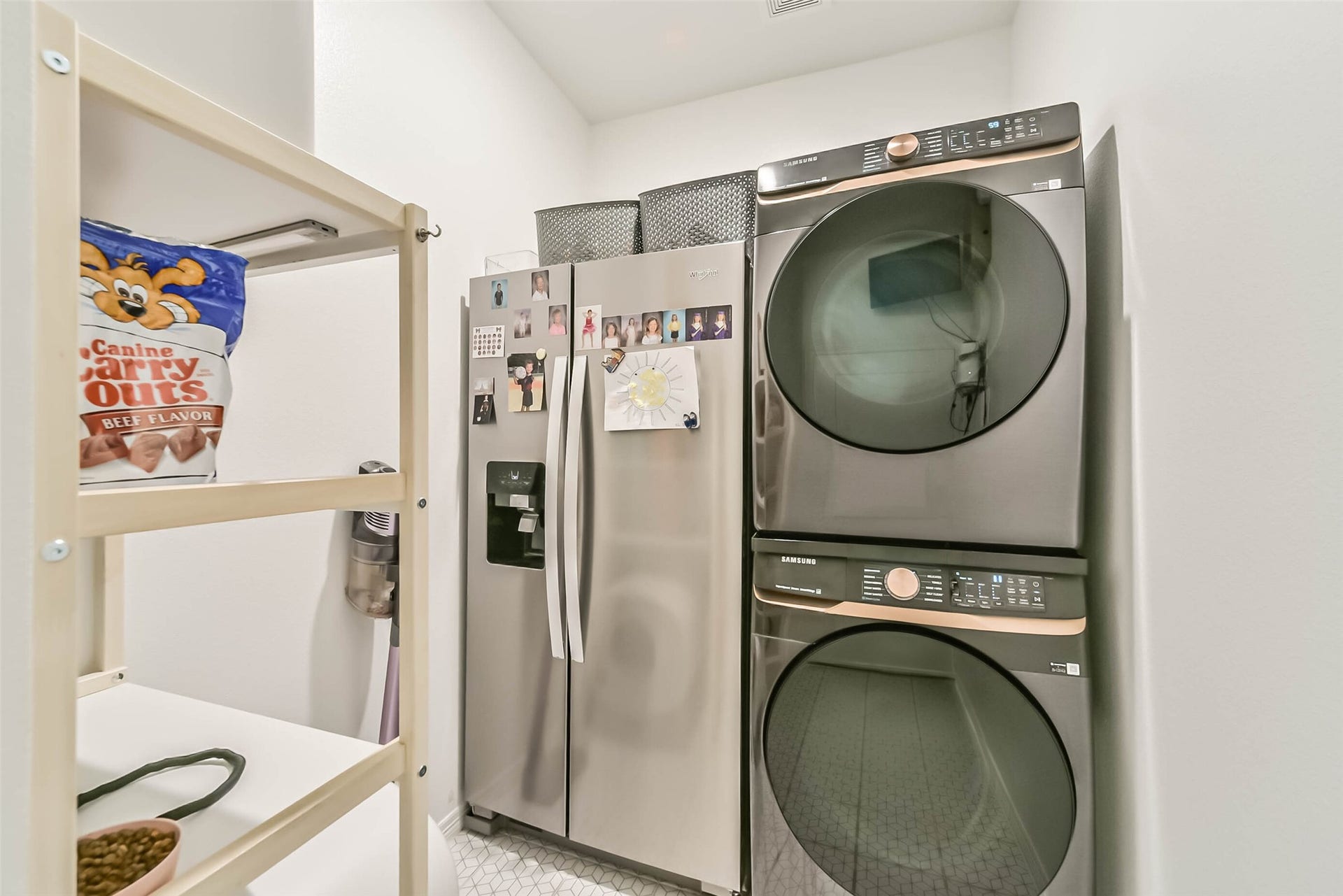 32403 Clouser Crawdad Court, Fulshear, TX 77441 Another builder upgrade in the laundry room for a stacked W/D to make room for a secondary fridge. Great for large families.