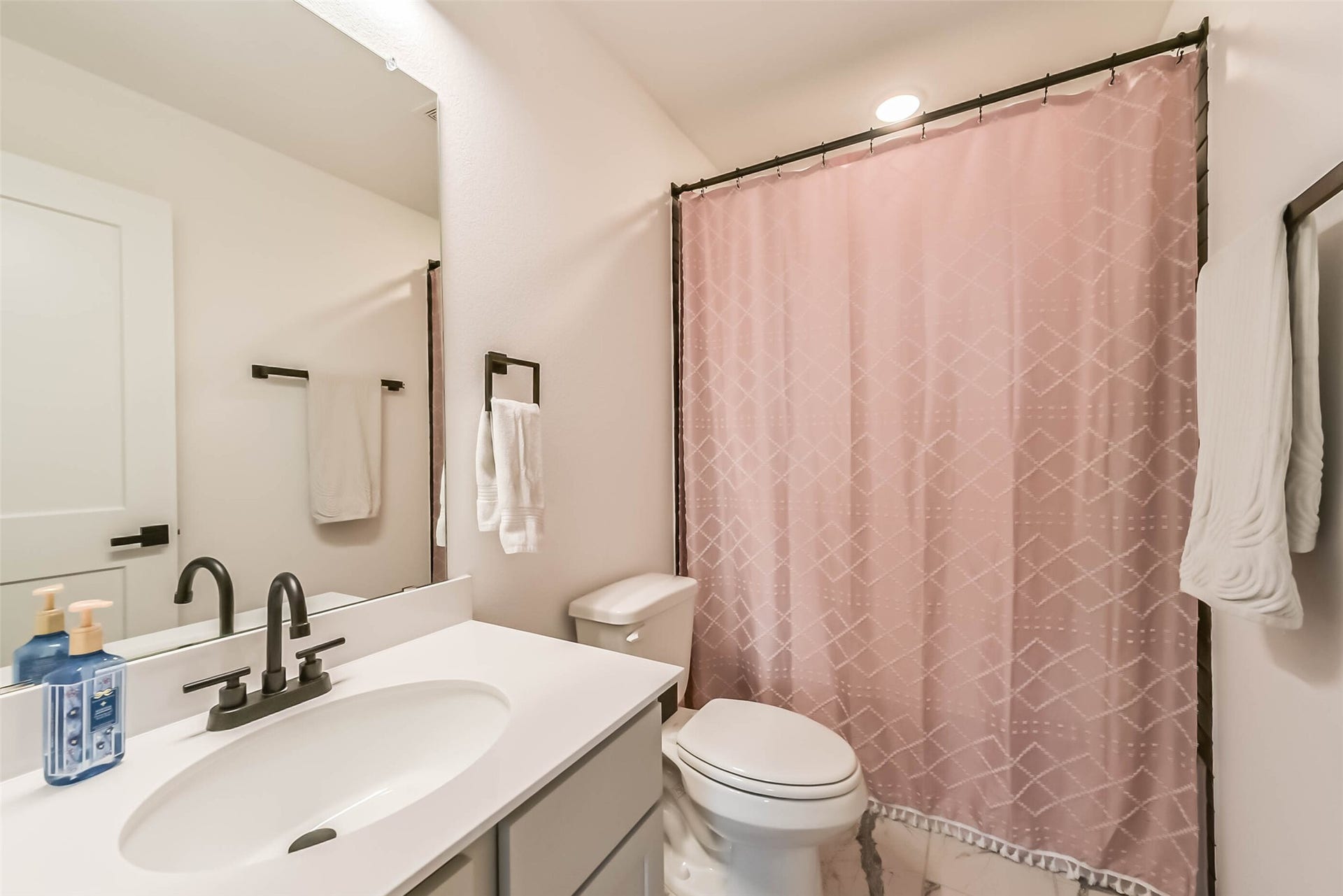 32403 Clouser Crawdad Court, Fulshear, TX 77441 This bathroom also has a shower/tub combo.