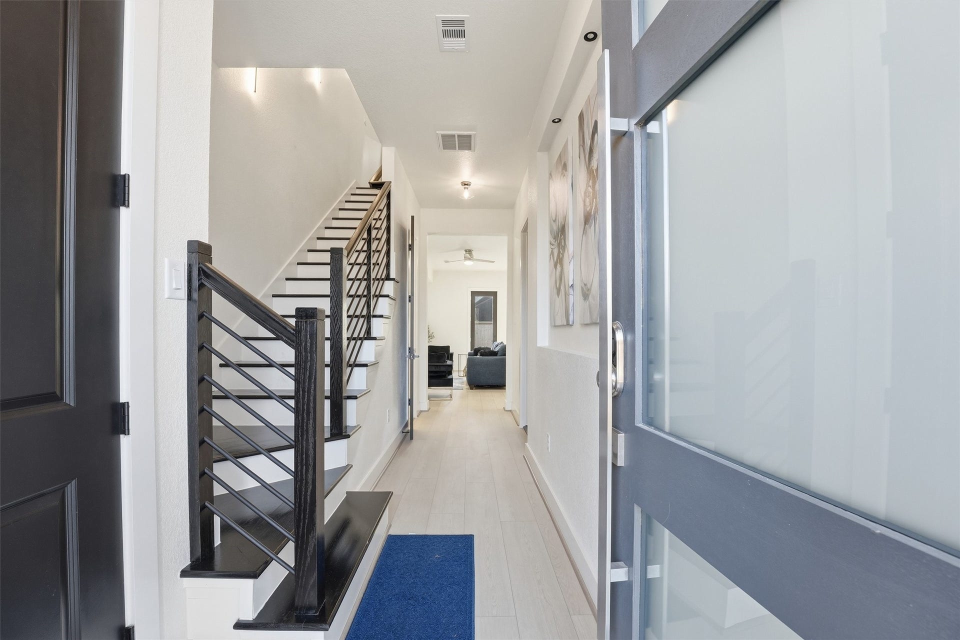 7908 Brandon Street, Houston, TX 77051 Gorgeous entry, to your left it takes you to all bedrooms upstair. Straight ahead is the kitchen and living room.