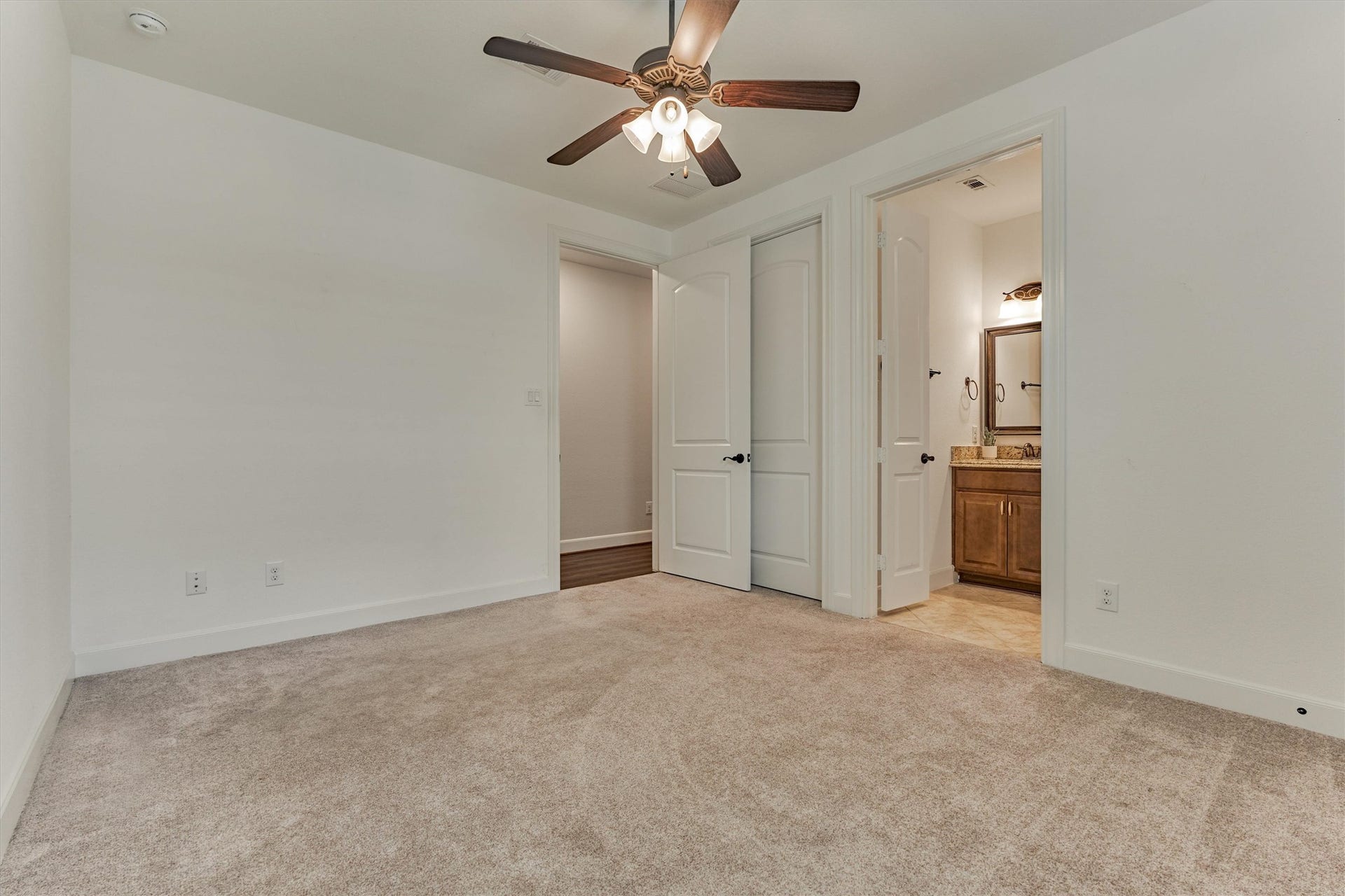 11 S Sandbells Park Lane, Montgomery, TX 77316 Another angle of secondary bedroom #2 showcasing the roominess and the en suite bathroom.