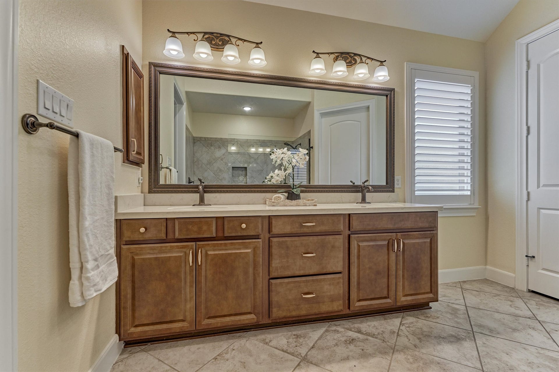 11 S Sandbells Park Lane, Montgomery, TX 77316 Featuring dual vanities and fine appointments throughout.