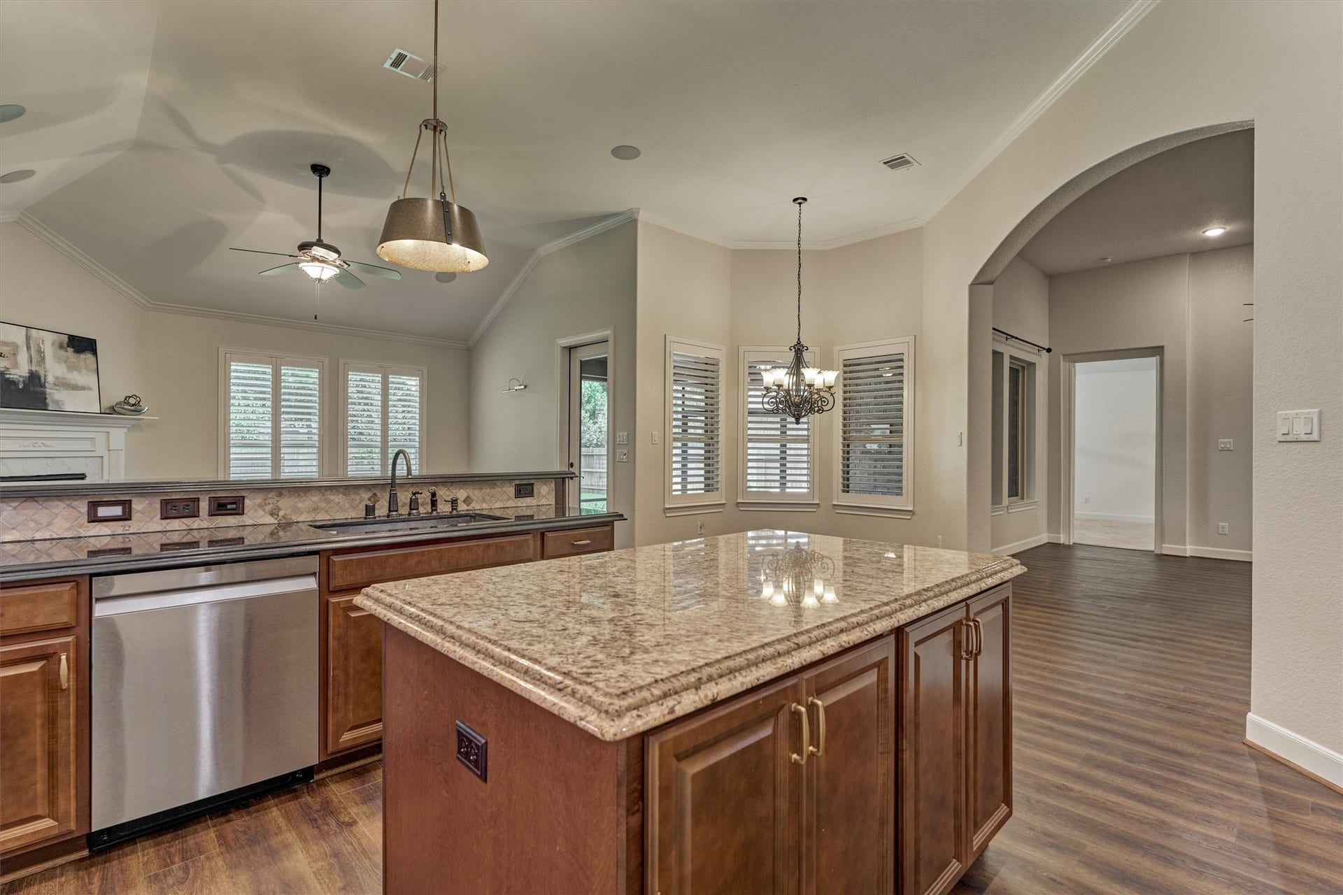 11 S Sandbells Park Lane, Montgomery, TX 77316 This angle showcase the blended living spaces and displays that the kitchen is the hub of the home.