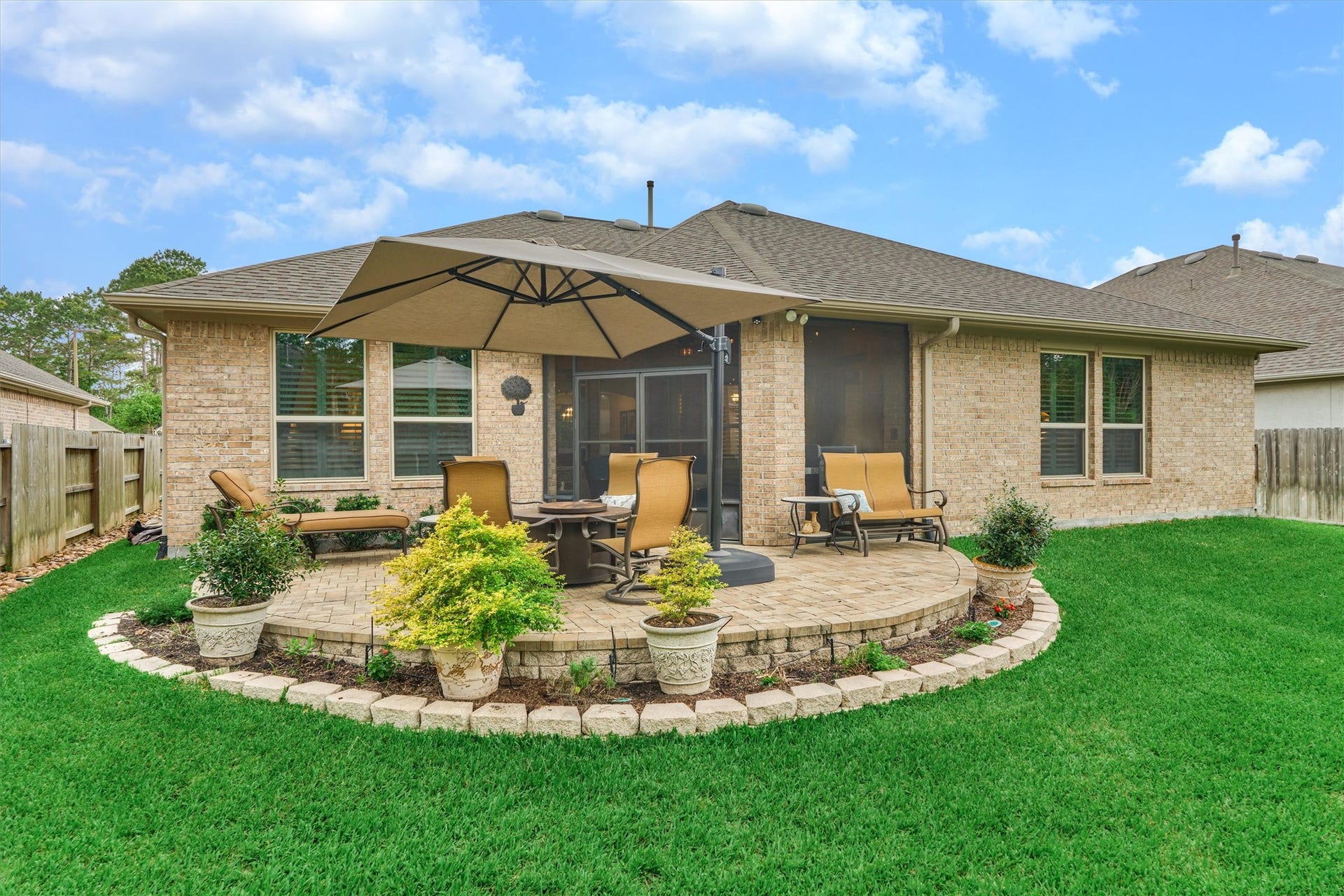 11 S Sandbells Park Lane, Montgomery, TX 77316 The gardener of the family has plenty of opportunities to exercise their green thumb. Note: French-style screen doors.