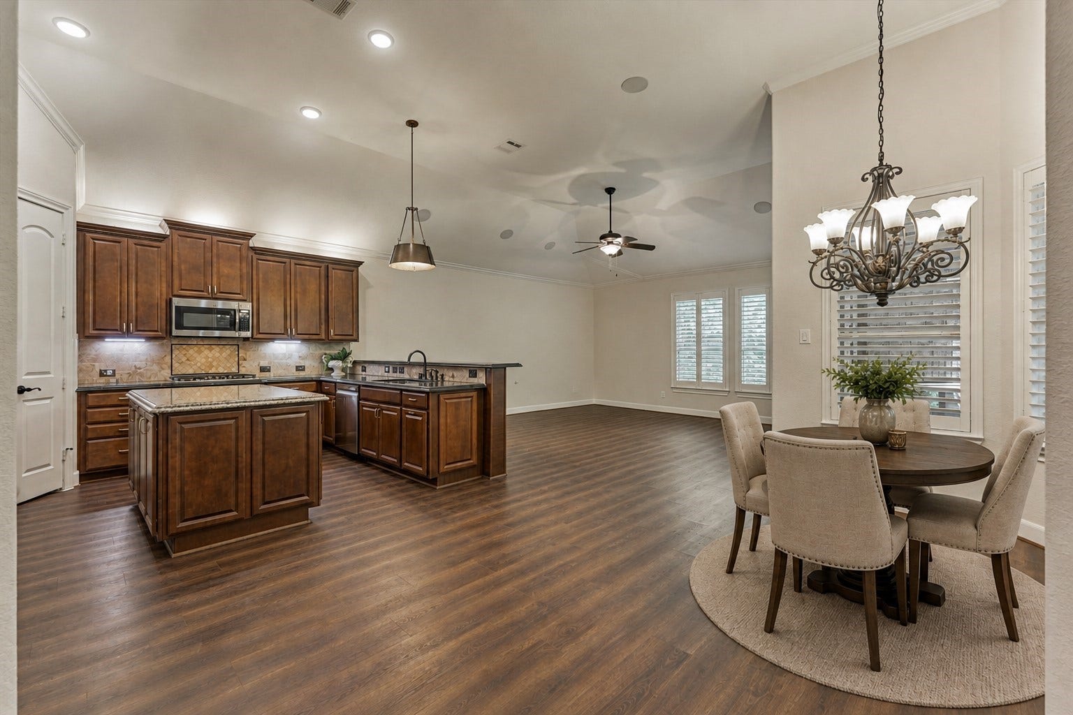 11 S Sandbells Park Lane, Montgomery, TX 77316 *This photo is virtually staged* The kitchen, breakfast room, and den exude space and design with a spacious floorplan!