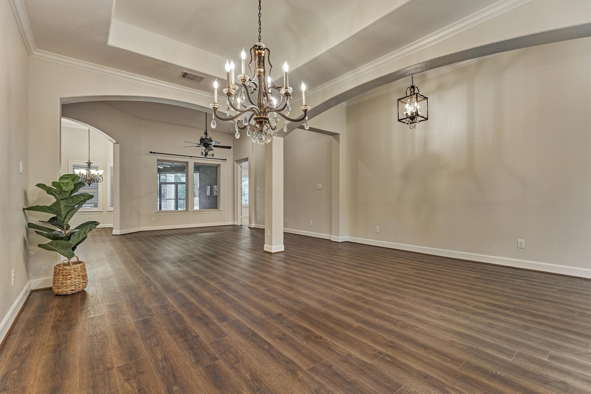 11 S Sandbells Park Lane, Montgomery, TX 77316 A stunning chandelier anchors the formal dining room.