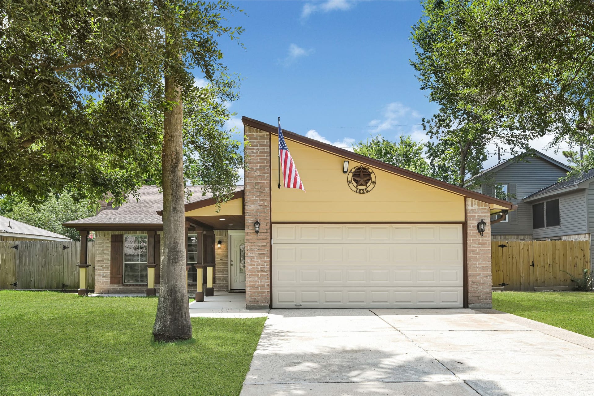 Front view of 4806 Hickorygate, with double wide driveway.