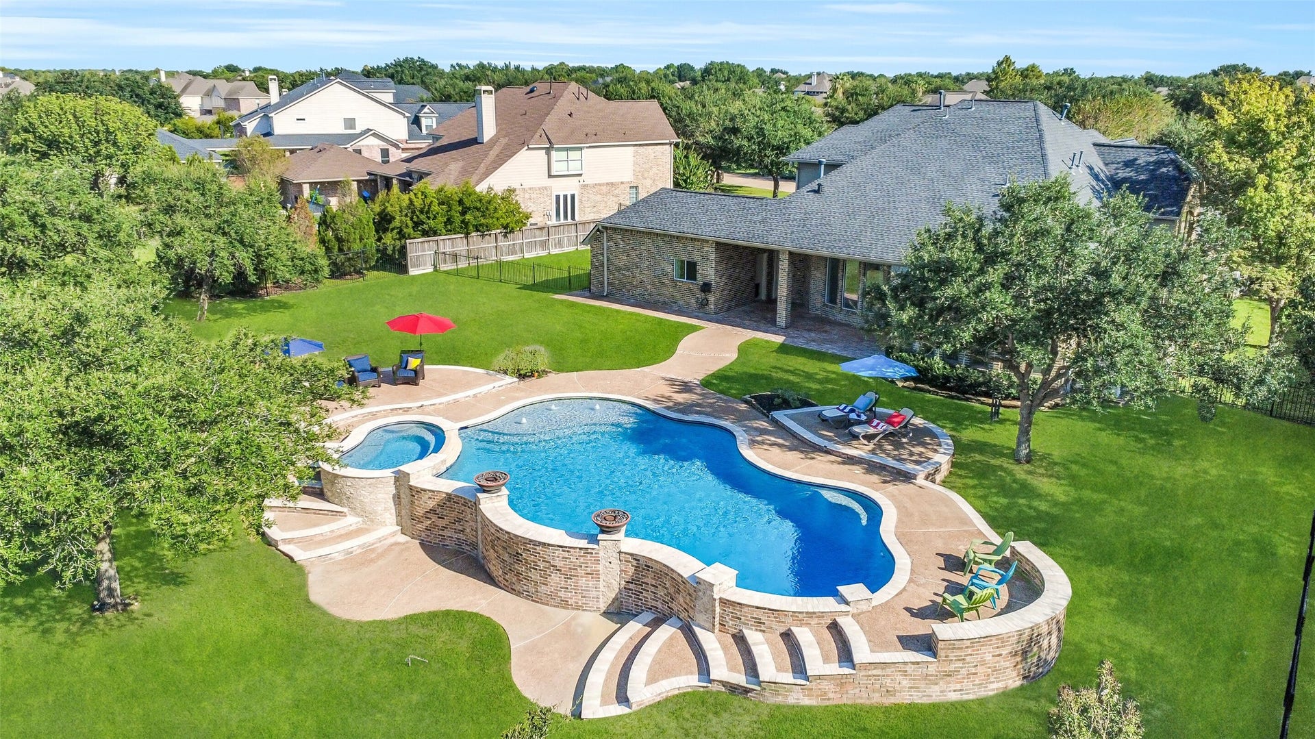 21018 W Farwood Terrace, Cypress, TX 77433 Oversize pool and hot tub with spacious backyard and privacy views.