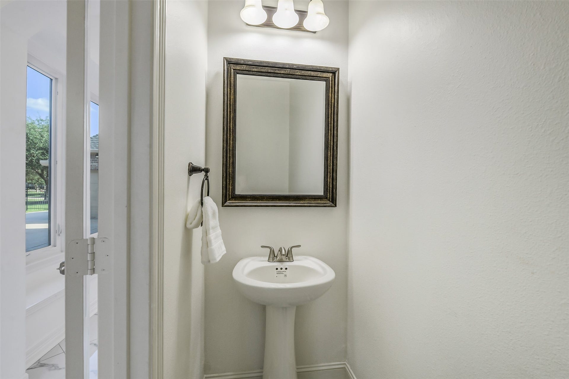21018 W Farwood Terrace, Cypress, TX 77433 Half bath accessible by back door. 2 of 2 half baths. Perfect as a pool access bathroom.