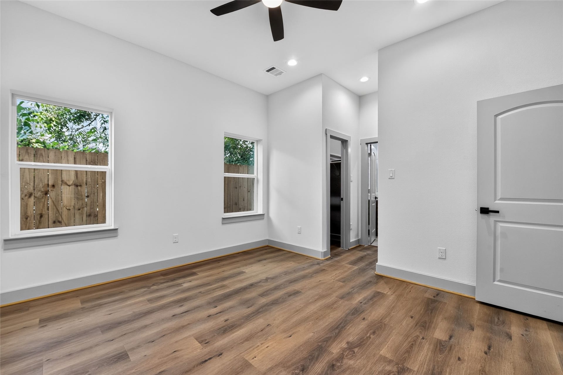 6815 Stearns Street, Houston, TX 77021 A serene main-level sanctuary has generous windows that frame peaceful views while bathing the primary suite in bright eleganceoffering main-floor convenience with an airy, refined feel.