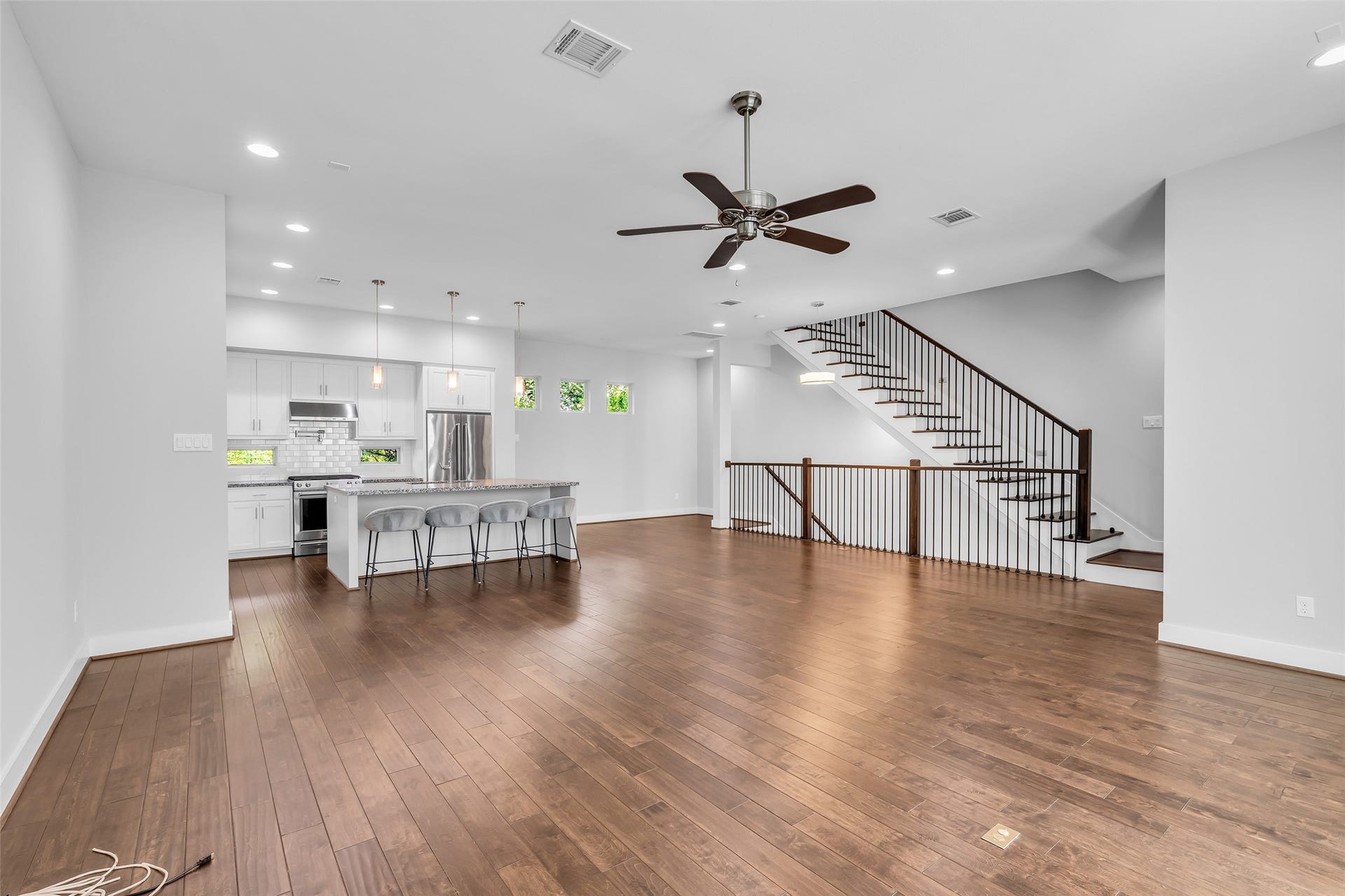 3309 Jefferson Street, #C, Houston, TX 77003 Additional view of the open living room space, providing a clearer perspective of its layout and scale, ideal for planning furniture arrangement and future interior setup.