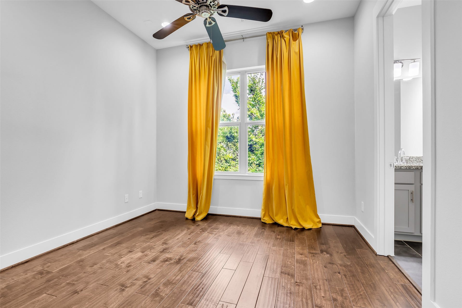 3309 Jefferson Street, #C, Houston, TX 77003 Secondary bedroom filled with natural light, offering a bright and comfortable space that can be used for sleeping, work, or other flexible needs.