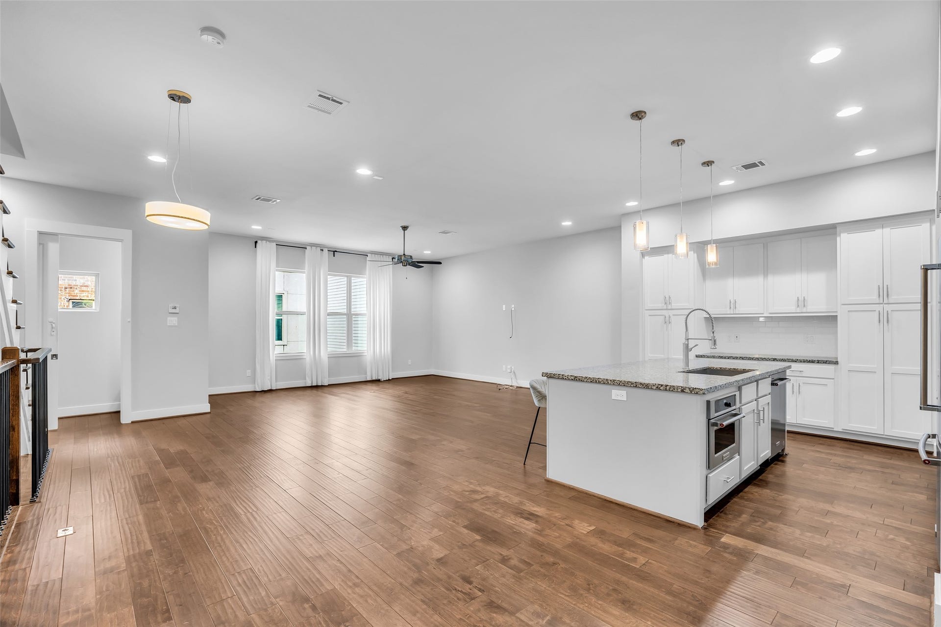 3309 Jefferson Street, #C, Houston, TX 77003 The second floor features the main living spaces, including the living room, kitchen, and dining area. The layout creates an open and functional setting for everyday activities and gatherings