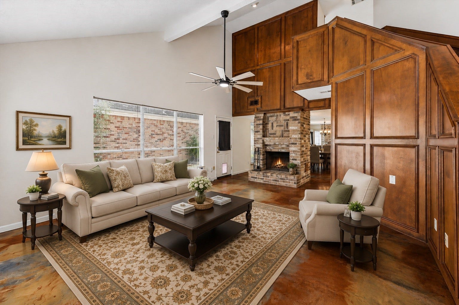3806 Crystal Falls Drive, Missouri City, TX 77459 Virtually Staged - Soaring ceilings and expansive windows create an airy, light-filled setting centered around the fireplace.